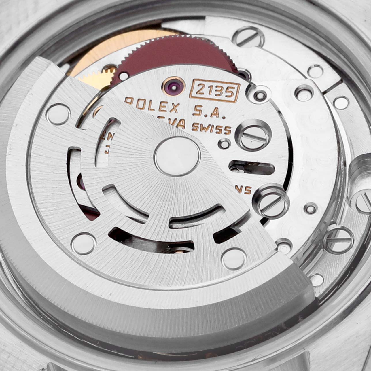 The image shows the movement mechanism of a Rolex Datejust 69173 Women's Steel and Gold (two tone) Silver Dial 69173 Women's Steel and Gold (two tone) Silver Dial, focusing on the rotor and gears.