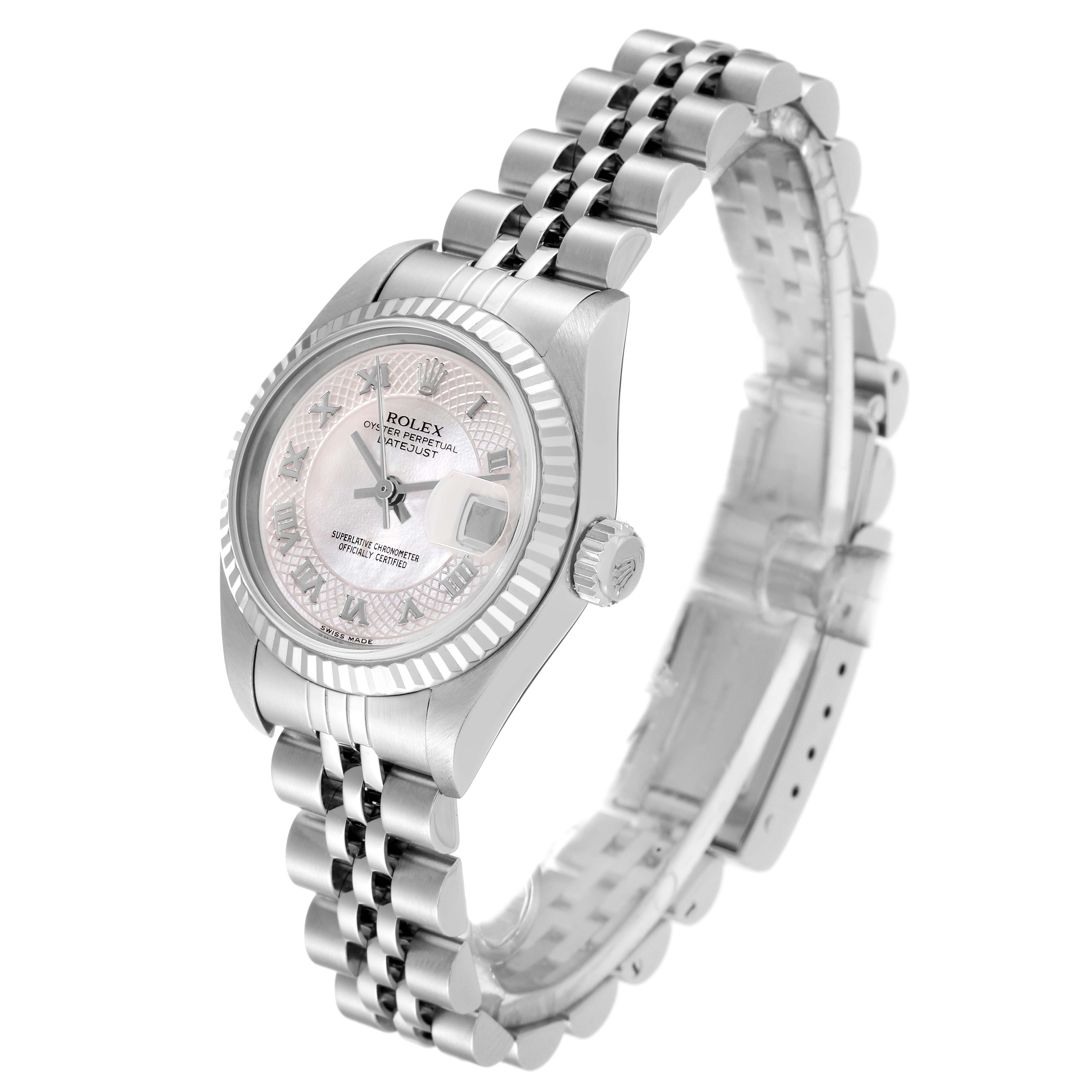 This image shows a Rolex Datejust 79174 Women's Stainless Steel Mother of Pearl Dial 79174 Women's Stainless Steel Mother of Pearl Dial watch from an angled view, displaying its face, bezel, crown, and Jubilee bracelet.
