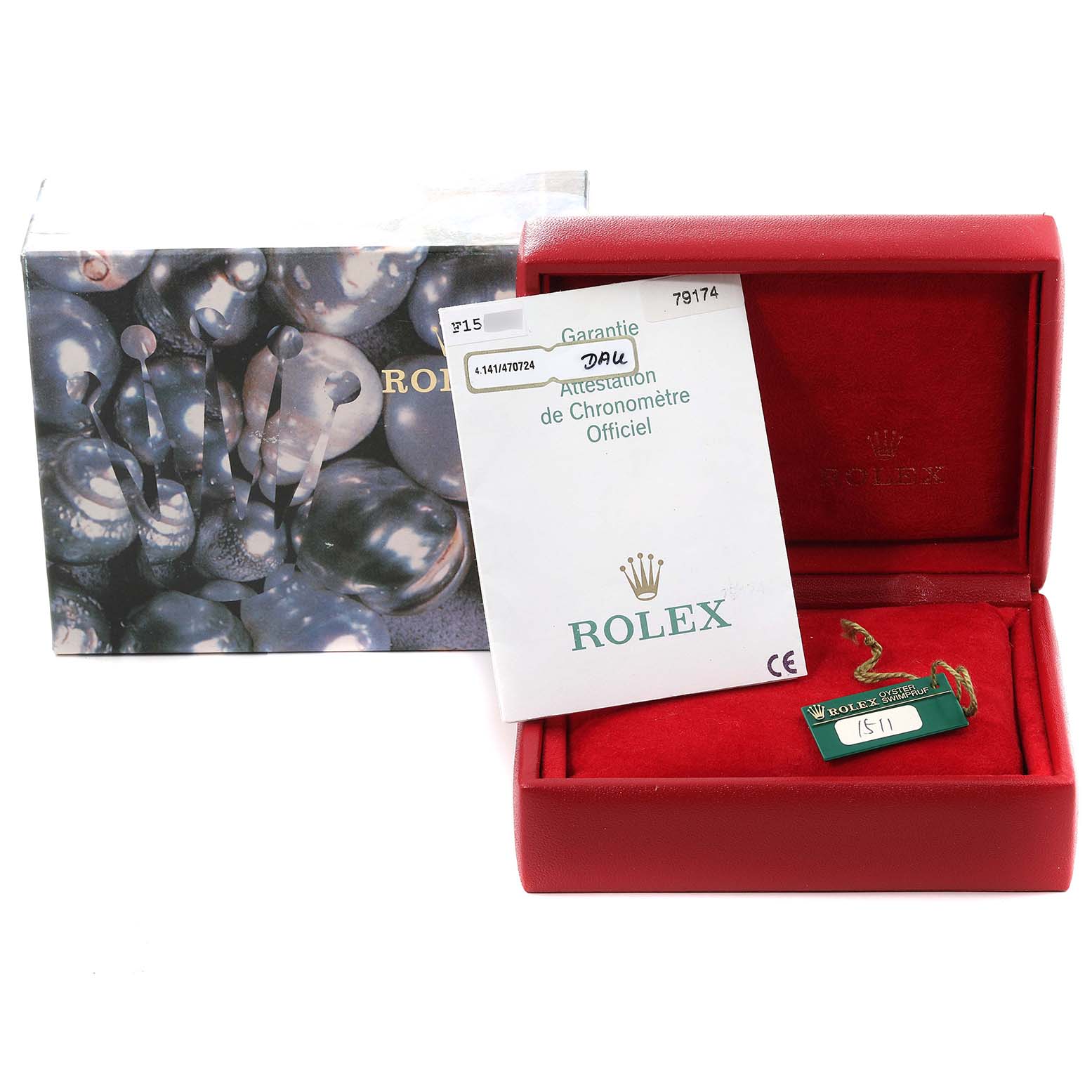 The image shows a Rolex Datejust 79174 Women's Stainless Steel Mother of Pearl Dial 79174 Women's Stainless Steel Mother of Pearl Dial's packaging box, guarantee certificate, and a tag inside a red presentation case.