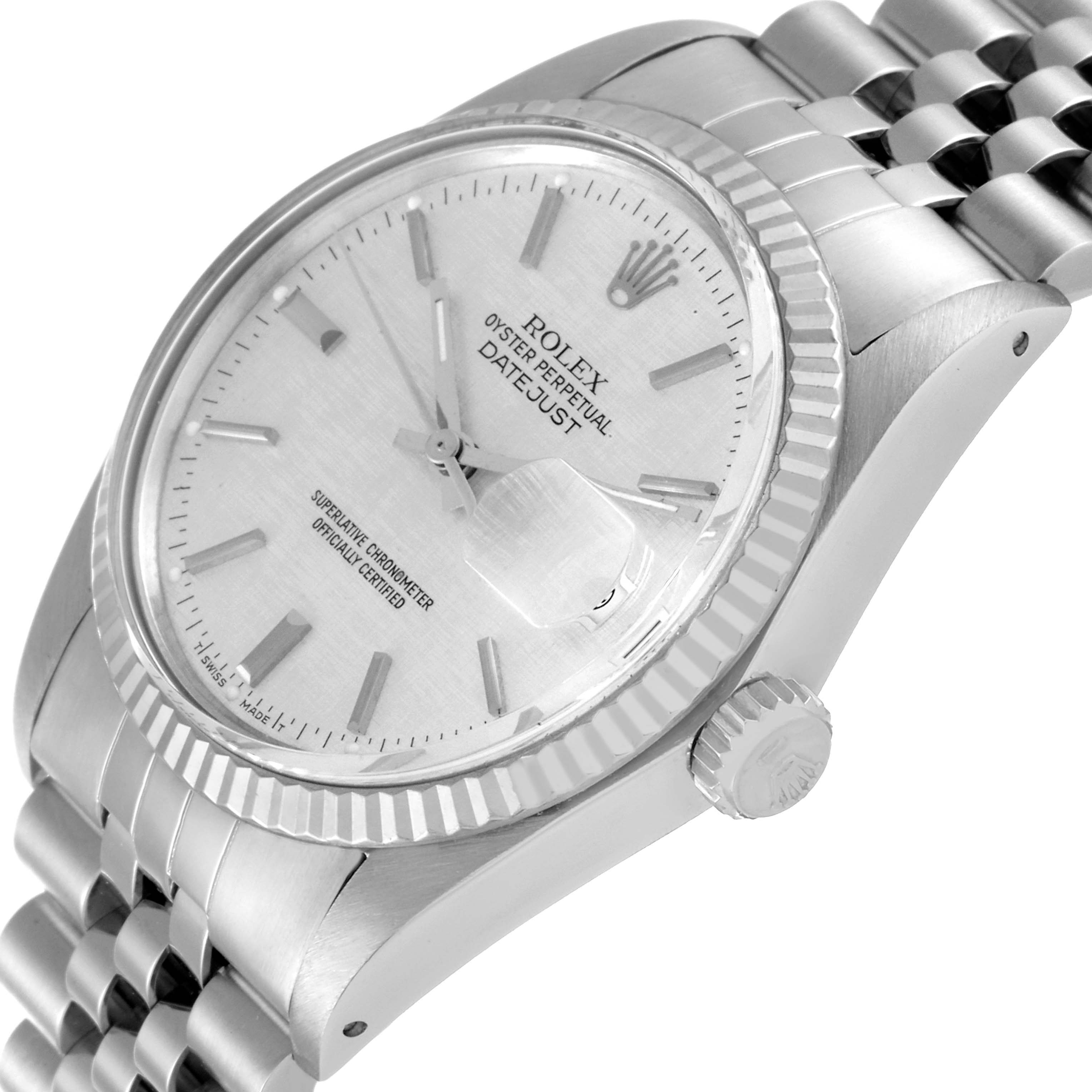 The image shows a close-up of the Rolex Datejust 16014 Men's Stainless Steel Silver Dial 16014 Men's Stainless Steel Silver Dial watch from an angled side view, detailing the crown, bezel, and band.
