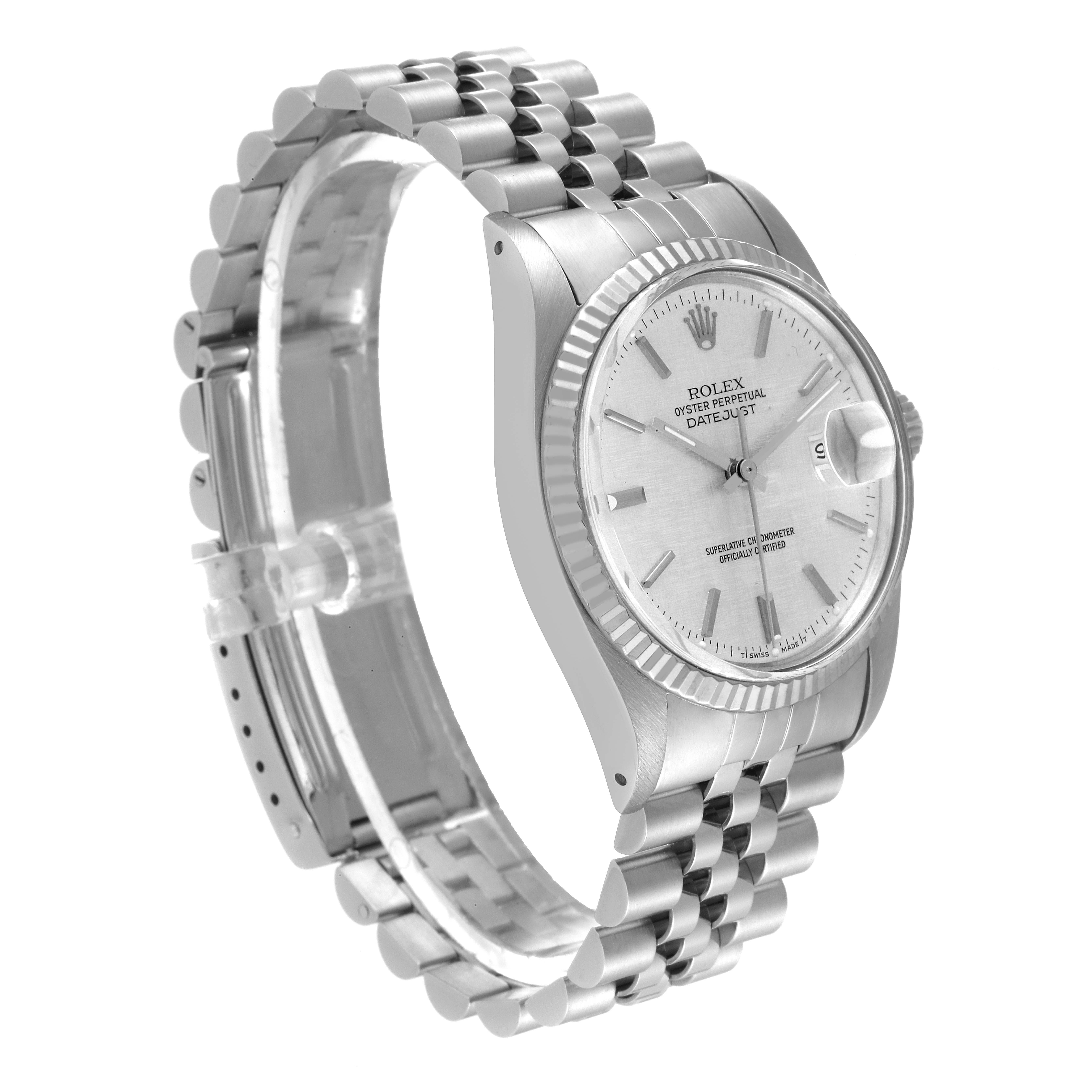 This image shows the Rolex Datejust 16014 Men's Stainless Steel Silver Dial 16014 Men's Stainless Steel Silver Dial watch from a side angle, highlighting the face, bezel, and part of the bracelet.