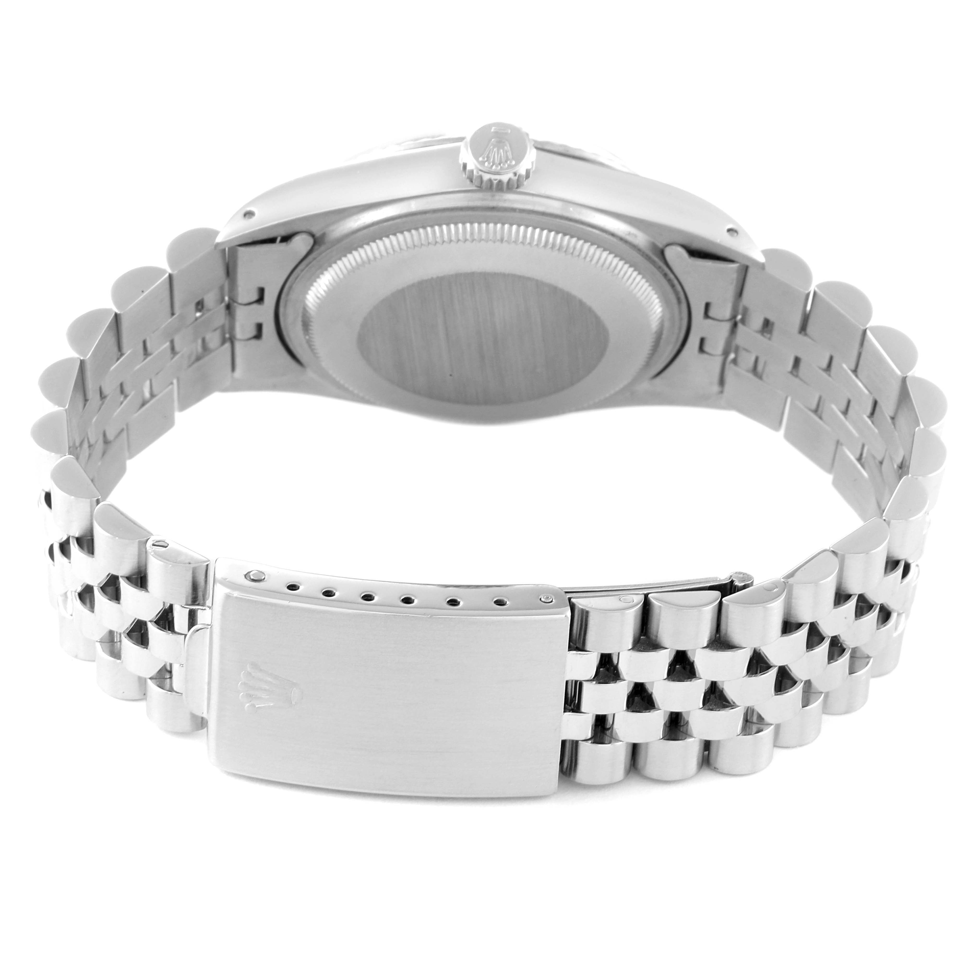 The image shows the back view of a Rolex Datejust 16014 Men's Stainless Steel Silver Dial 16014 Men's Stainless Steel Silver Dial watch, featuring its clasp and bracelet.