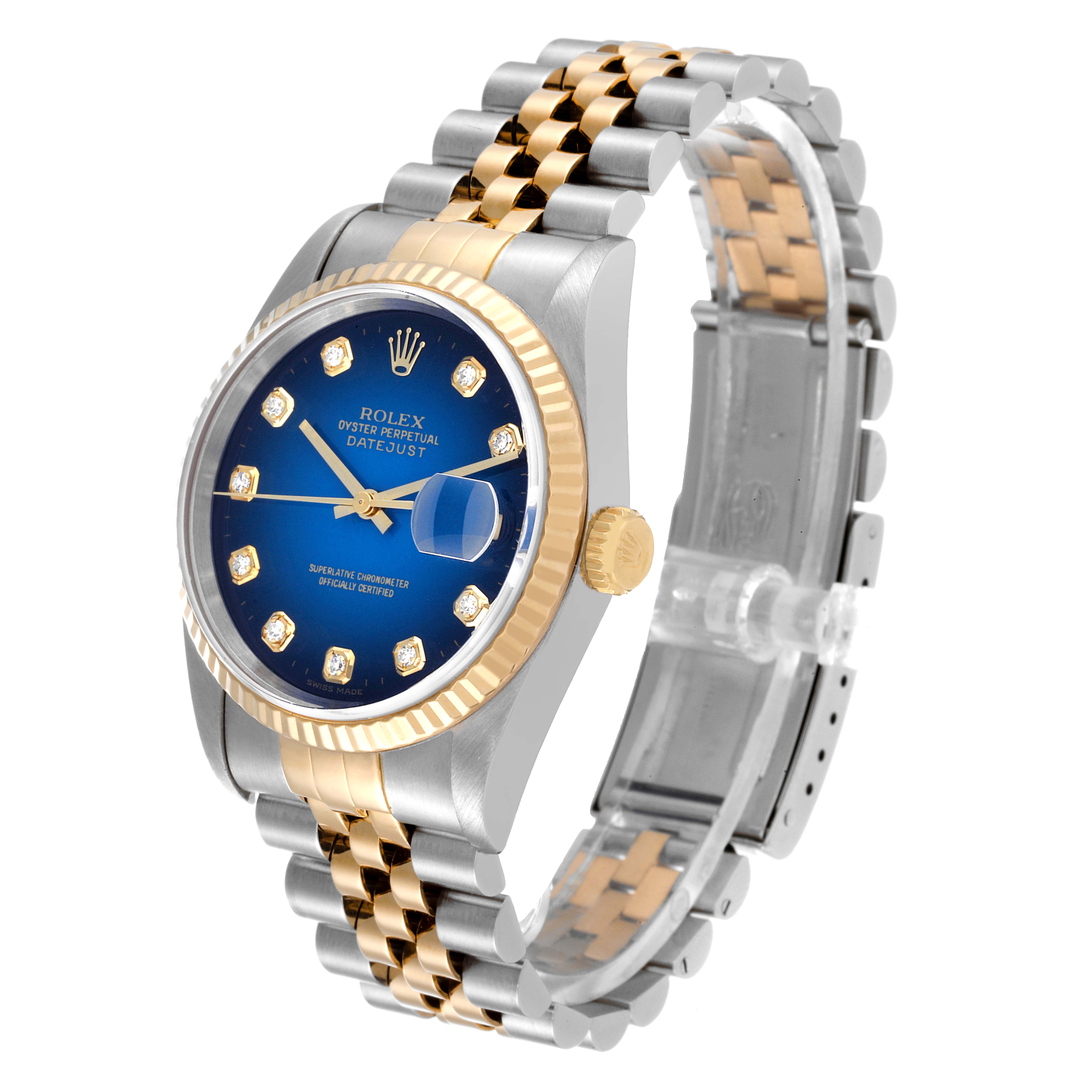 This image shows a Datejust model by Rolex from an angled side view, highlighting the blue dial, fluted bezel, and two-tone bracelet.