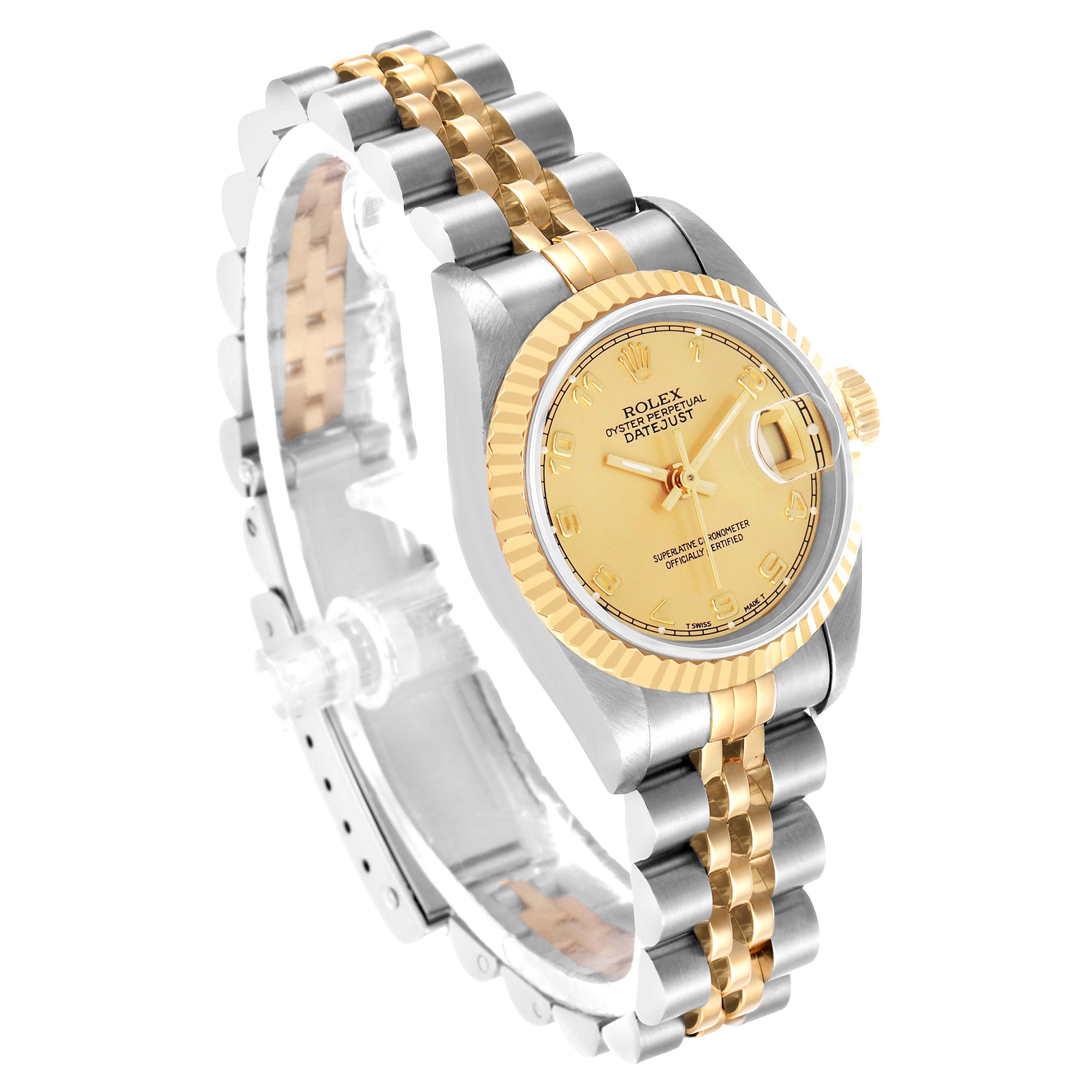 The Rolex Datejust 69173 Women's Steel and Gold (two tone) Champagne Dial watch is shown at an angled view, displaying the dial, fluted bezel, and two-tone Jubilee bracelet.
