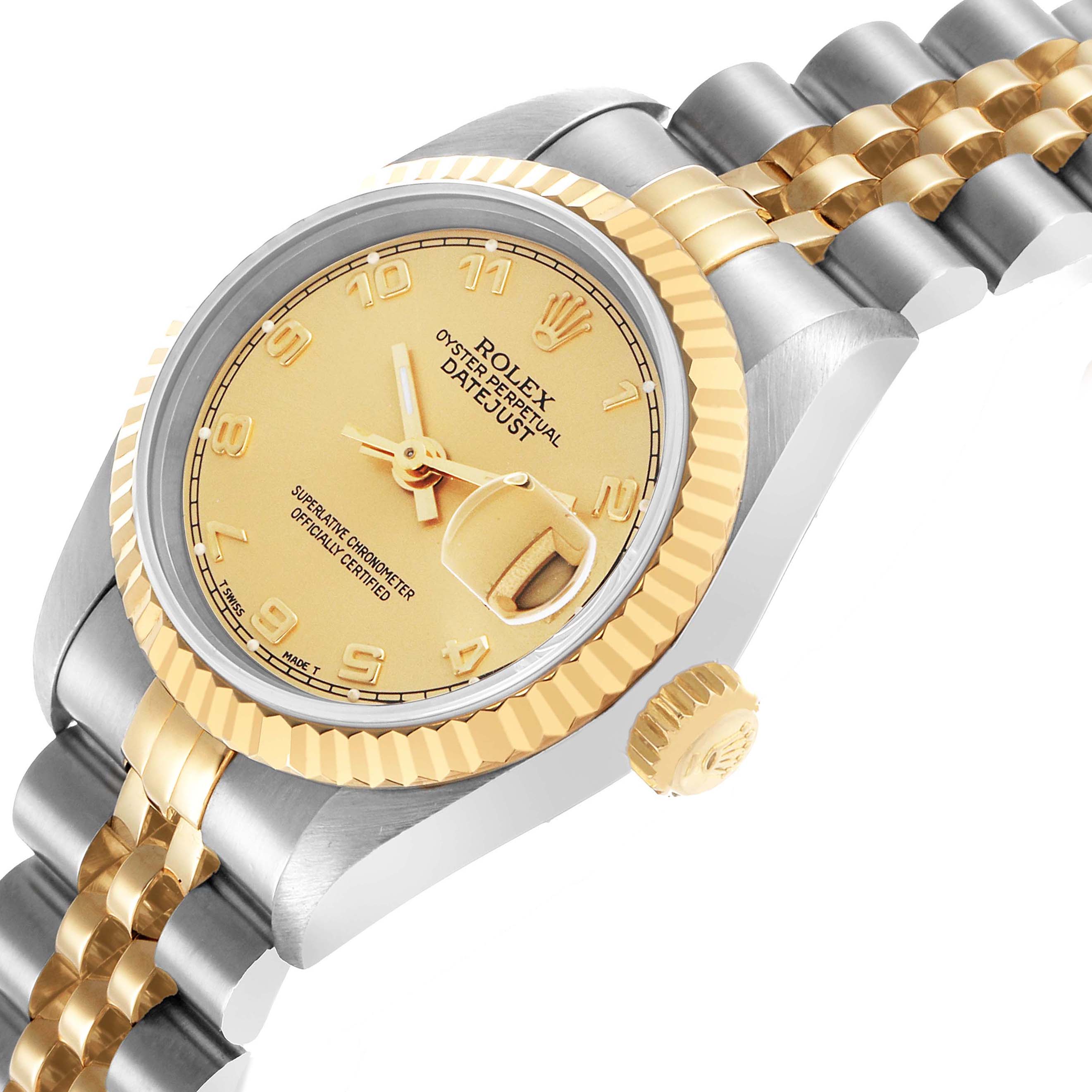 The Rolex Datejust 69173 Women's Steel and Gold (two tone) Champagne Dial watch is shown at an angle displaying the face, fluted bezel, crown, and part of the Jubilee bracelet.