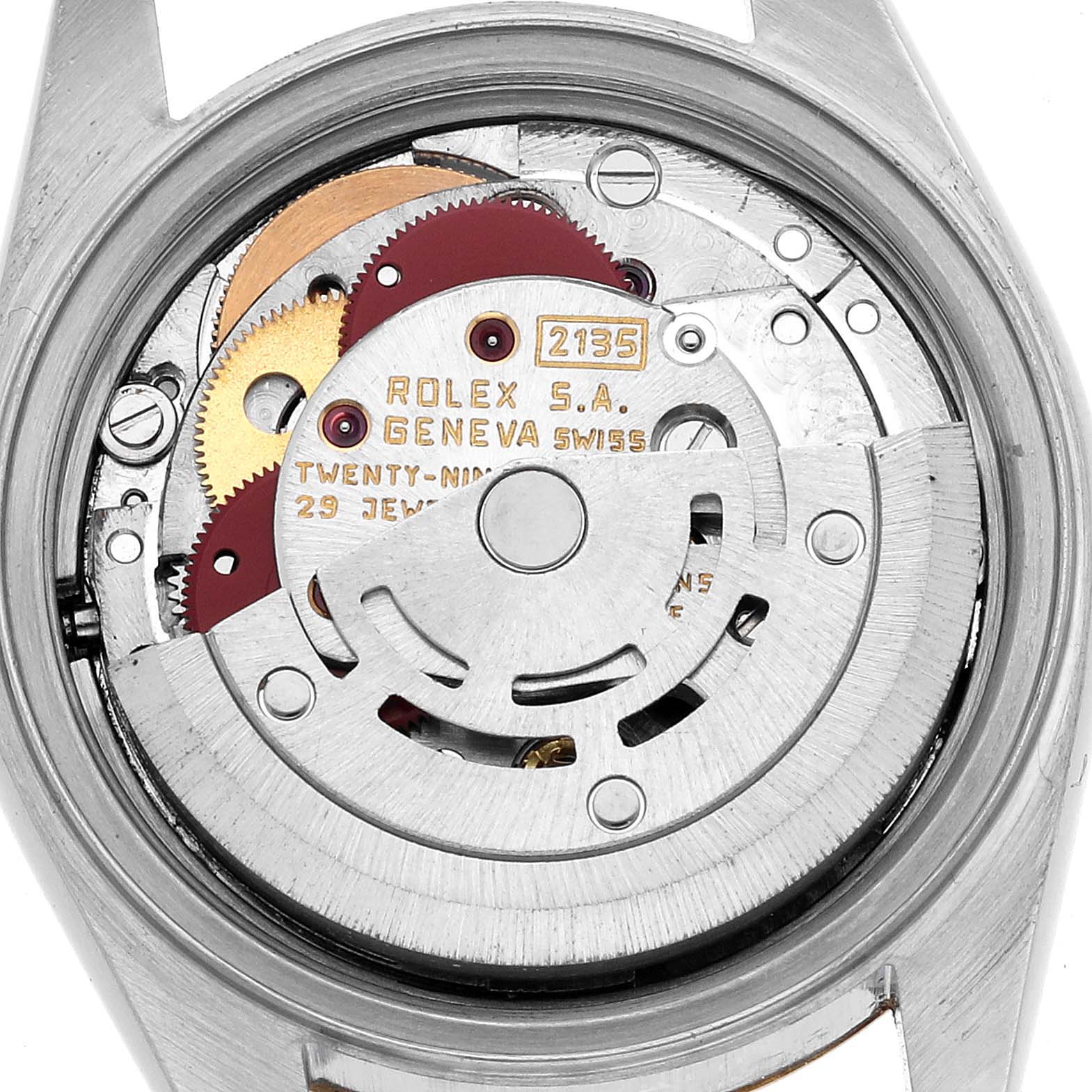 The image shows the back view of a Rolex Datejust 69173 Women's Steel and Gold (two tone) Champagne Dial watch, highlighting its movement and internal components.