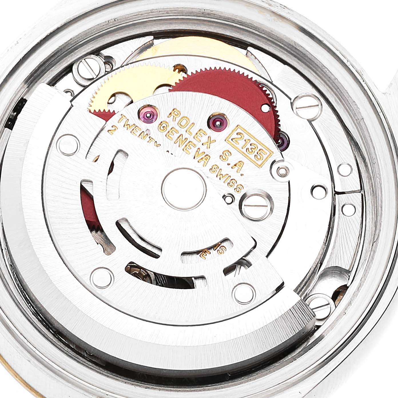 The image shows a close-up of the internal mechanical movement of a Rolex Datejust 69173 Women's Steel and Gold (two tone) Champagne Dial 69173 Women's Steel and Gold (two tone) Champagne Dial watch, highlighting gears and inscriptions.