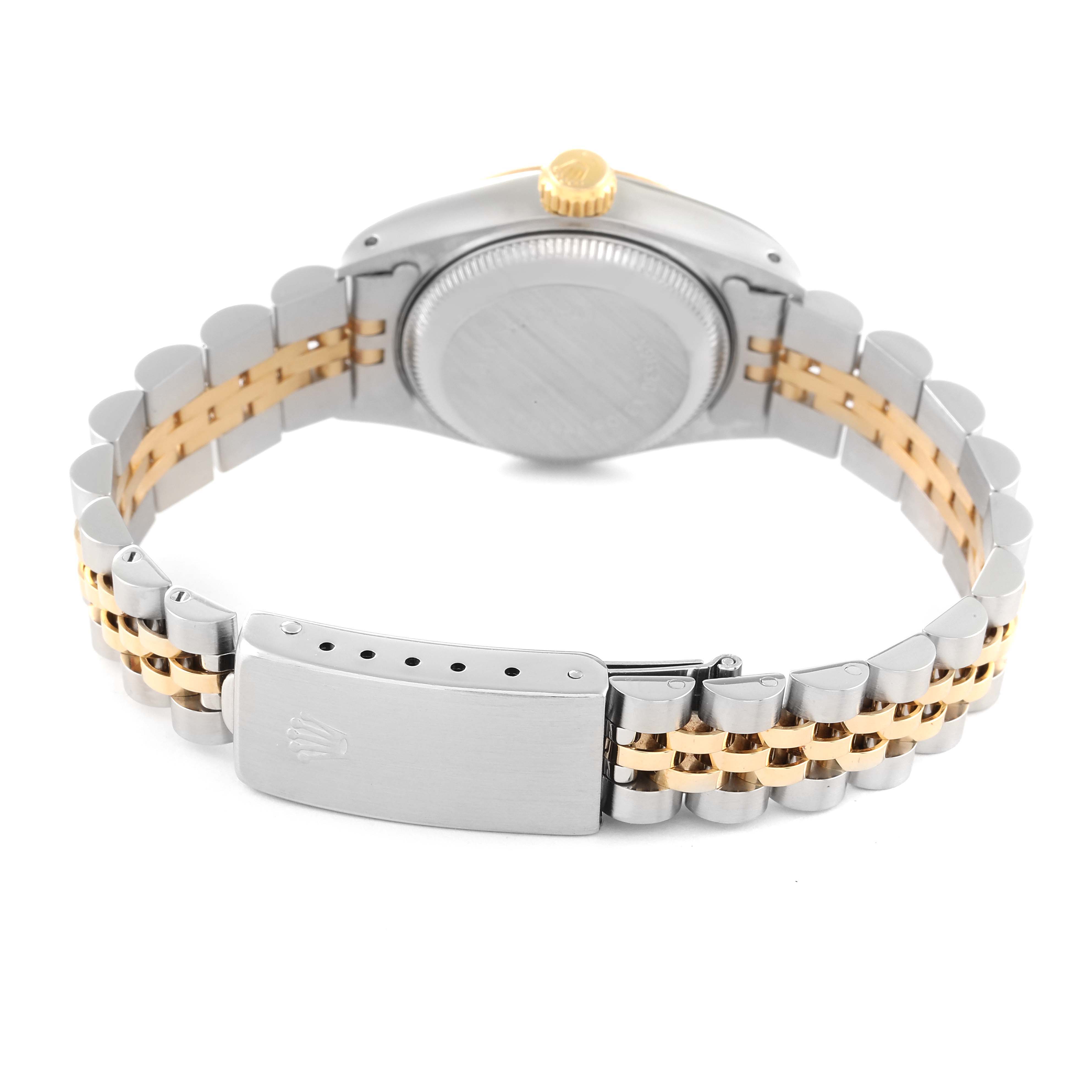 The image shows the backside of the Rolex Datejust 69173 Women's Steel and Gold (two tone) Champagne Dial 69173 Women's Steel and Gold (two tone) Champagne Dial watch, including its case back, crown, and two-tone bracelet with a clasp.