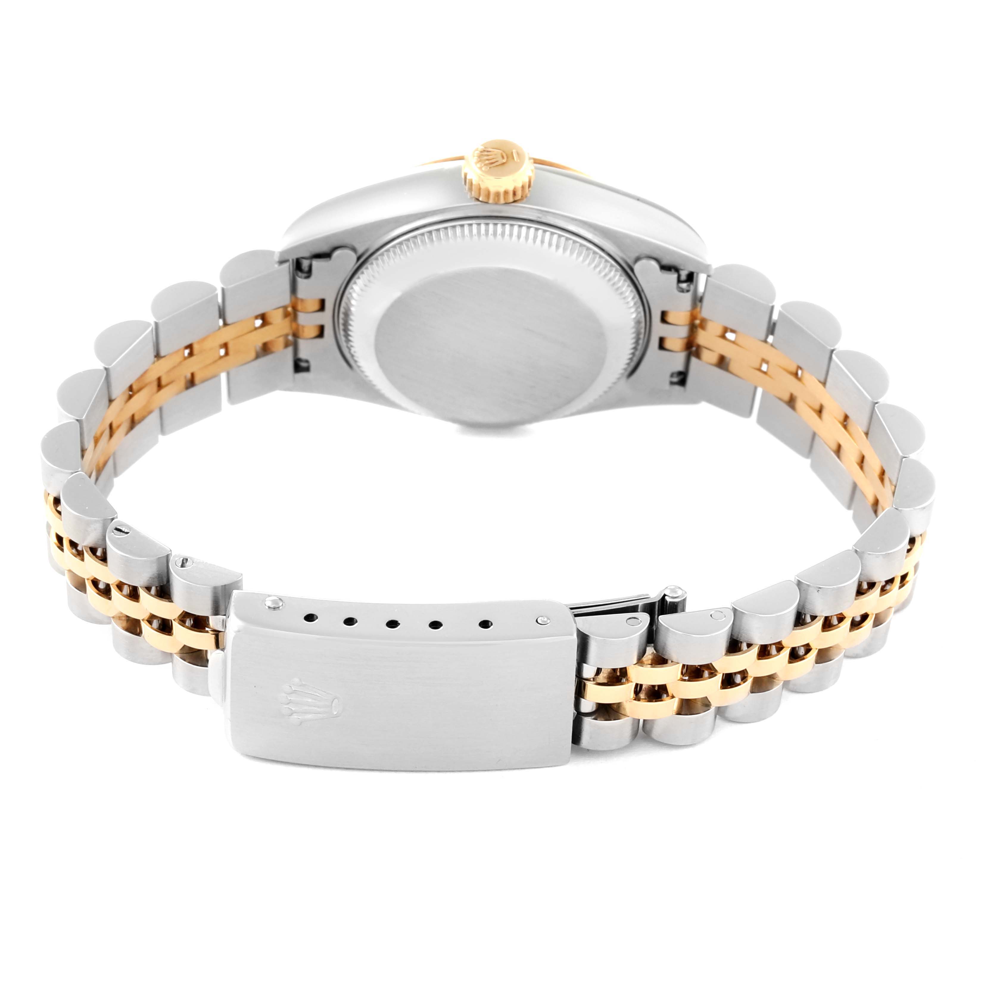 The image shows the back view of a Rolex Datejust 69173 Women's Steel and Gold (two tone) Champagne Dial 69173 Women's Steel and Gold (two tone) Champagne Dial watch, highlighting its clasp, bracelet, case back, and the crown.