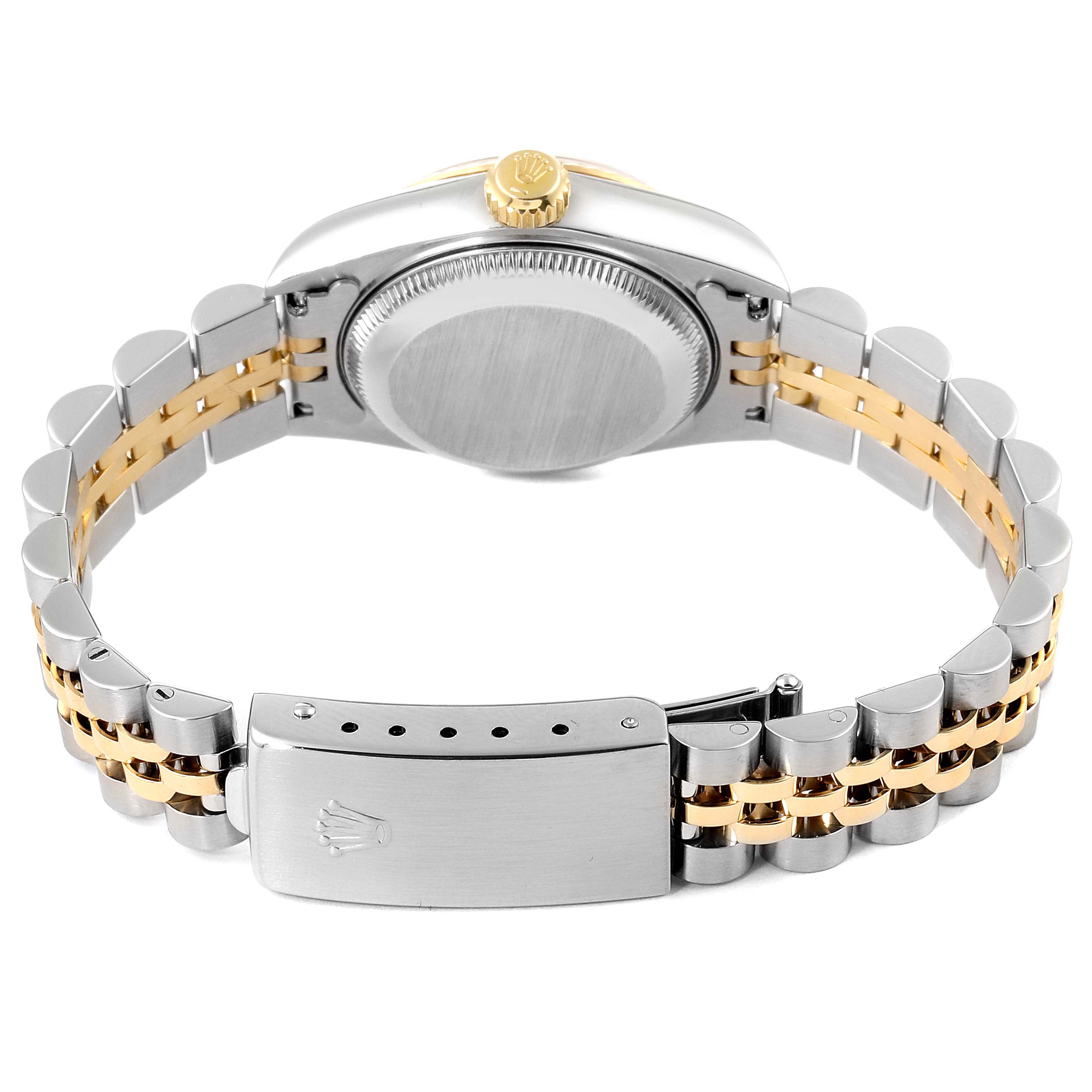 The image shows the back view of a Rolex Datejust 69173 Women
s Steel and Gold (two tone) Champagne Dial 69173 Women
s Steel and Gold (two tone) Champagne Dial watch and its two-tone metal bracelet and clasp.