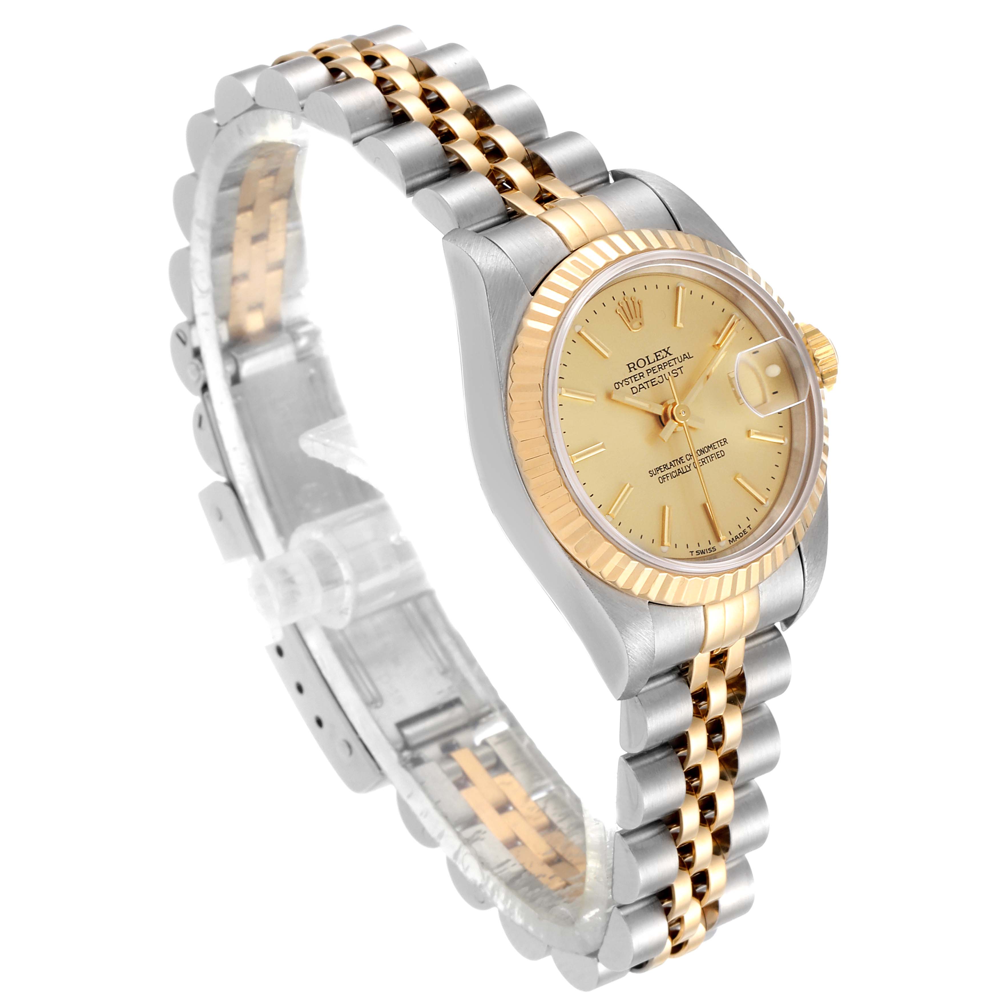 This Rolex Datejust 69173 Women
s Steel and Gold (two tone) Champagne Dial 69173 Women
s Steel and Gold (two tone) Champagne Dial watch is shown from an angled side view, displaying its two-tone bracelet, case, and dial.