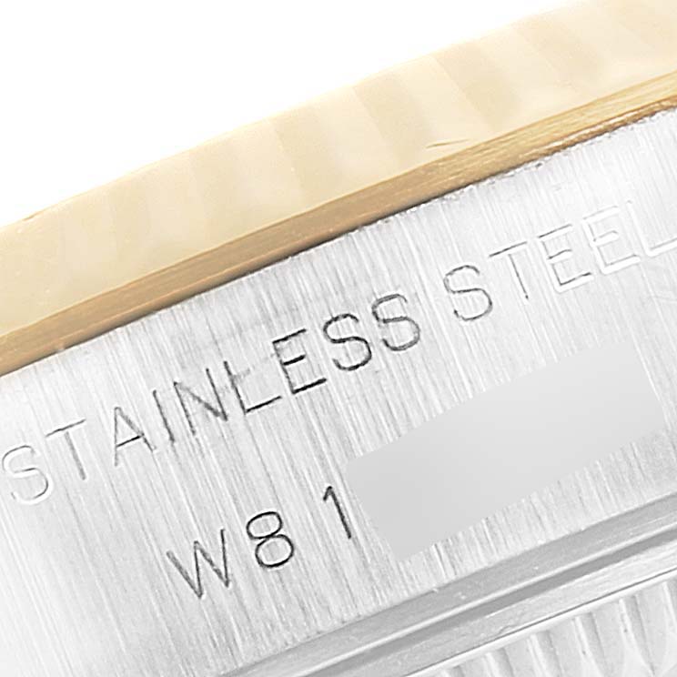 This close-up image shows the stainless steel case and part of the bezel of a Rolex Datejust 69173 Women's Steel and Gold (two tone) Champagne Dial 69173 Women's Steel and Gold (two tone) Champagne Dial watch.