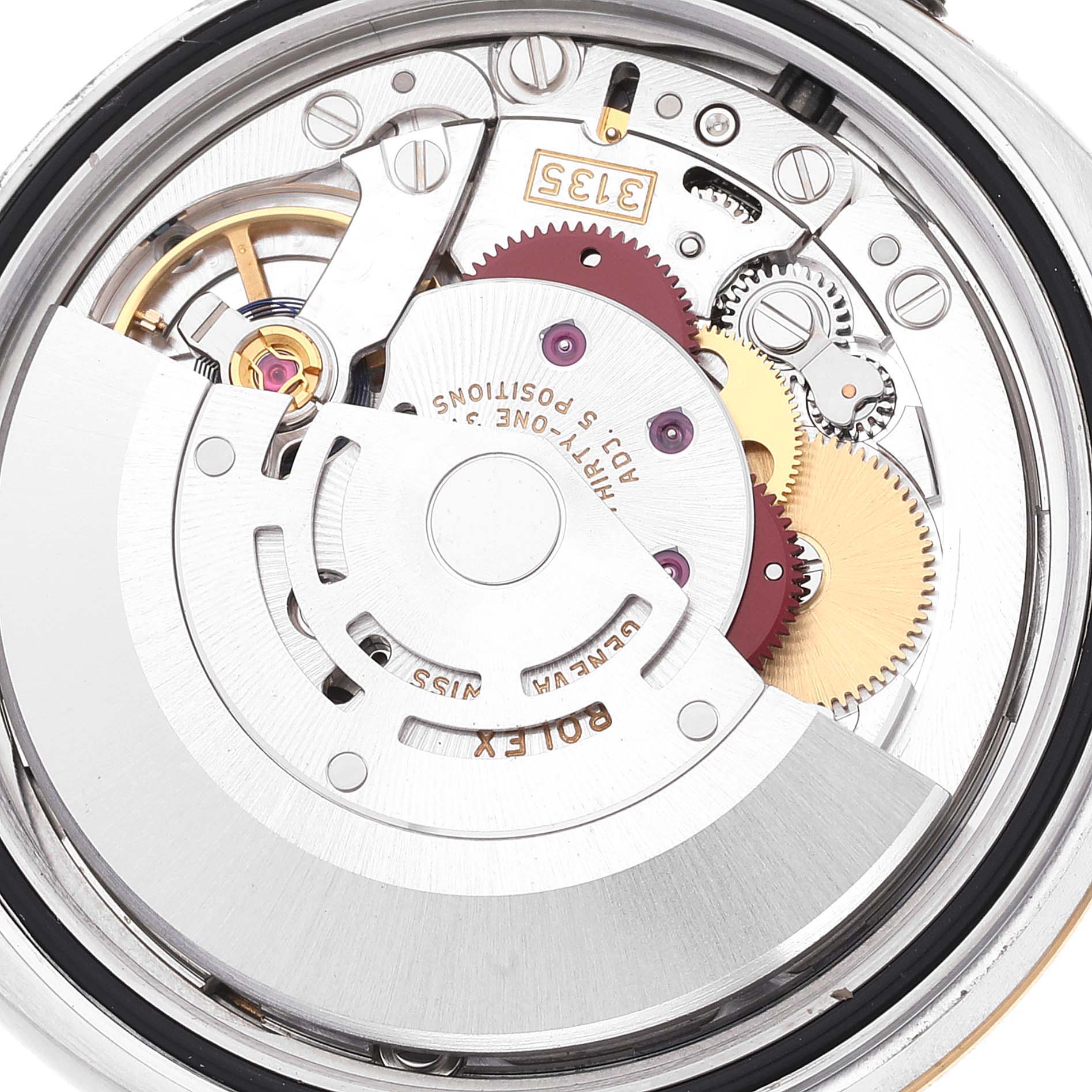 The image shows the inner mechanical movement parts of a Rolex Datejust 116233 Men's Steel and Gold (two tone) White Dial 116233 Men's Steel and Gold (two tone) White Dial watch from the back angle.