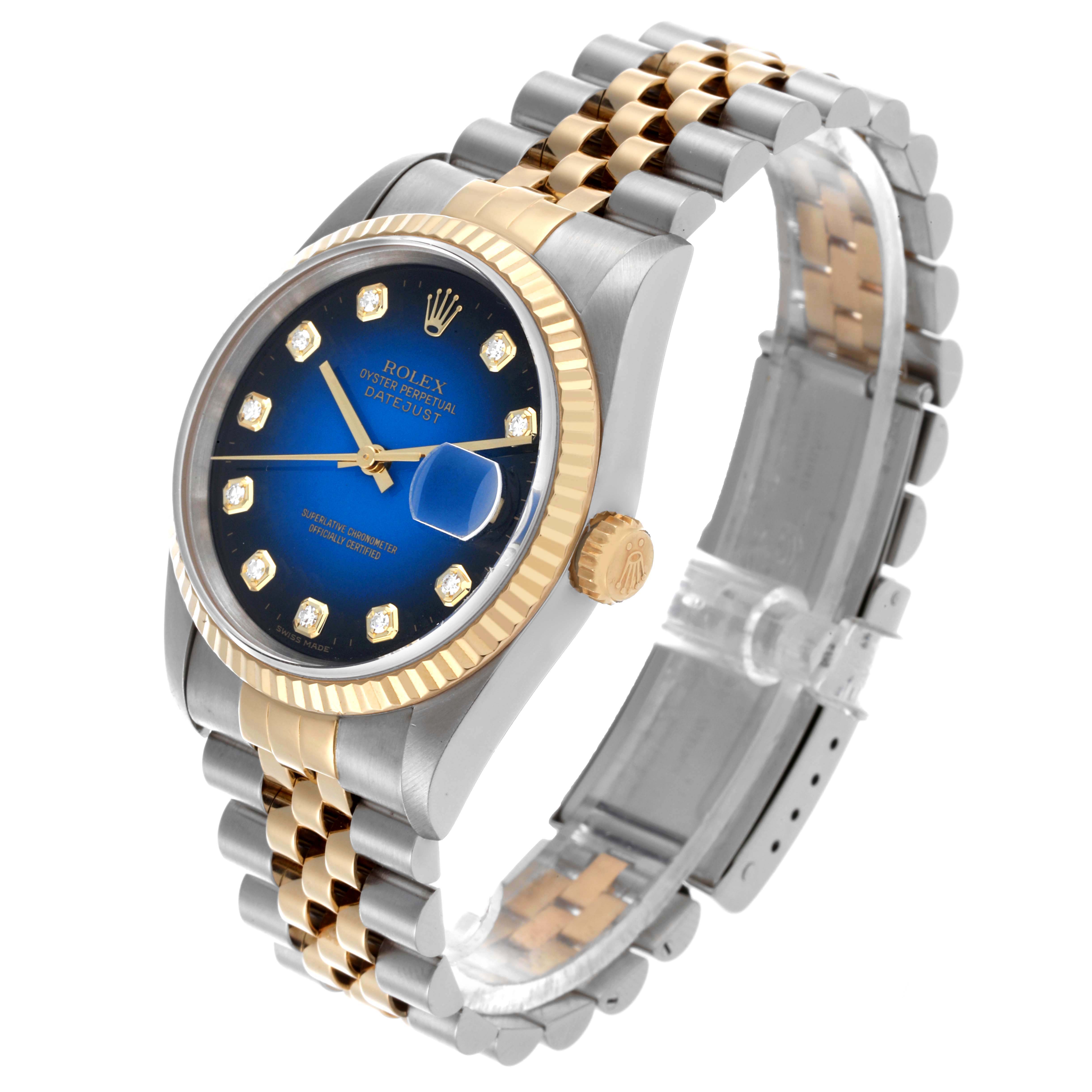 The Rolex Datejust 16233 Men's Steel and Gold (two tone) Blue Dial 16233 Men's Steel and Gold (two tone) Blue Dial watch is displayed in a side angle, showing the blue dial, gold bezel, and two-tone bracelet.