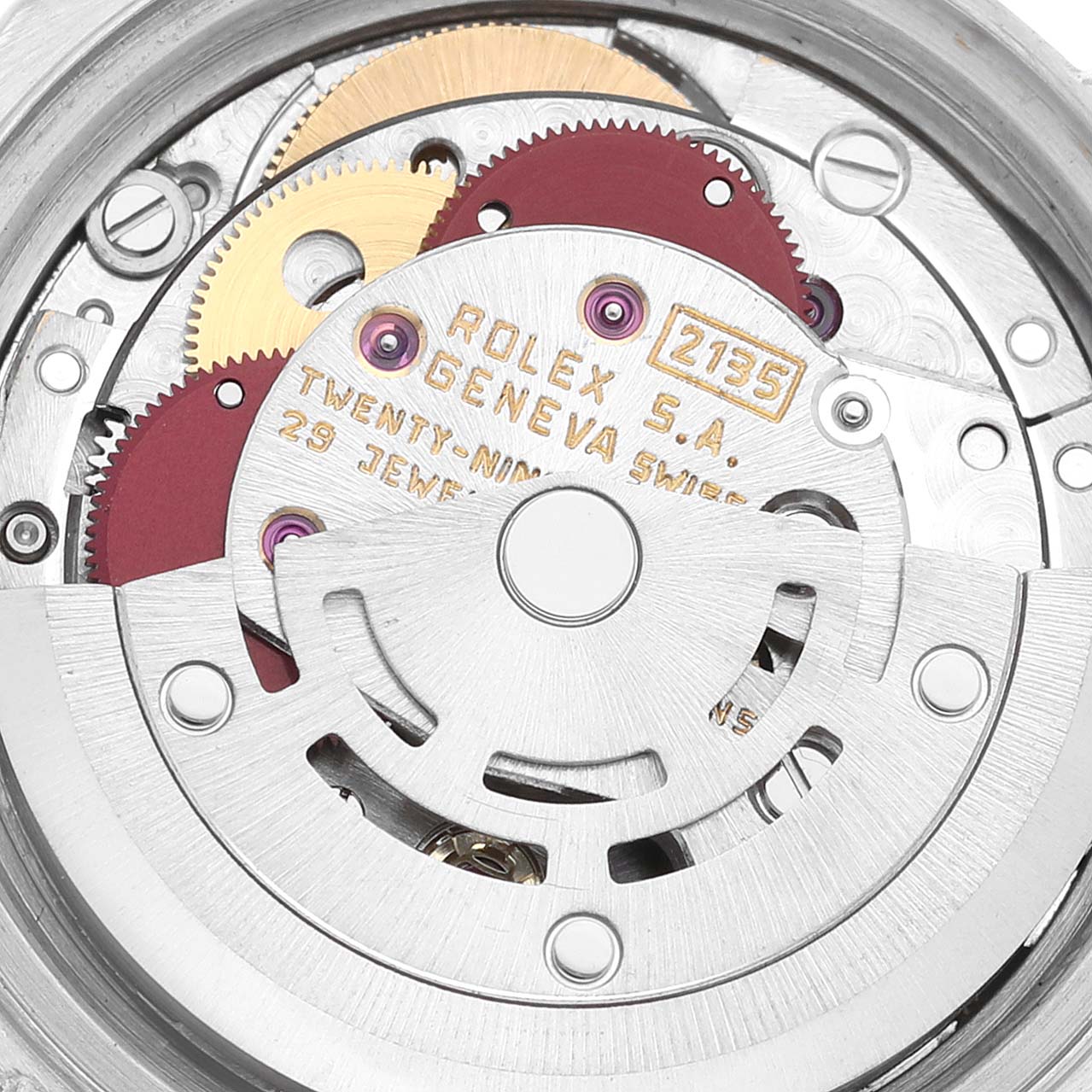 This is a detailed view of the Rolex Datejust 69173 Women's Steel and Gold (two tone) White Dial 69173 Women's Steel and Gold (two tone) White Dial movement, showcasing gears and internal mechanisms from the back.