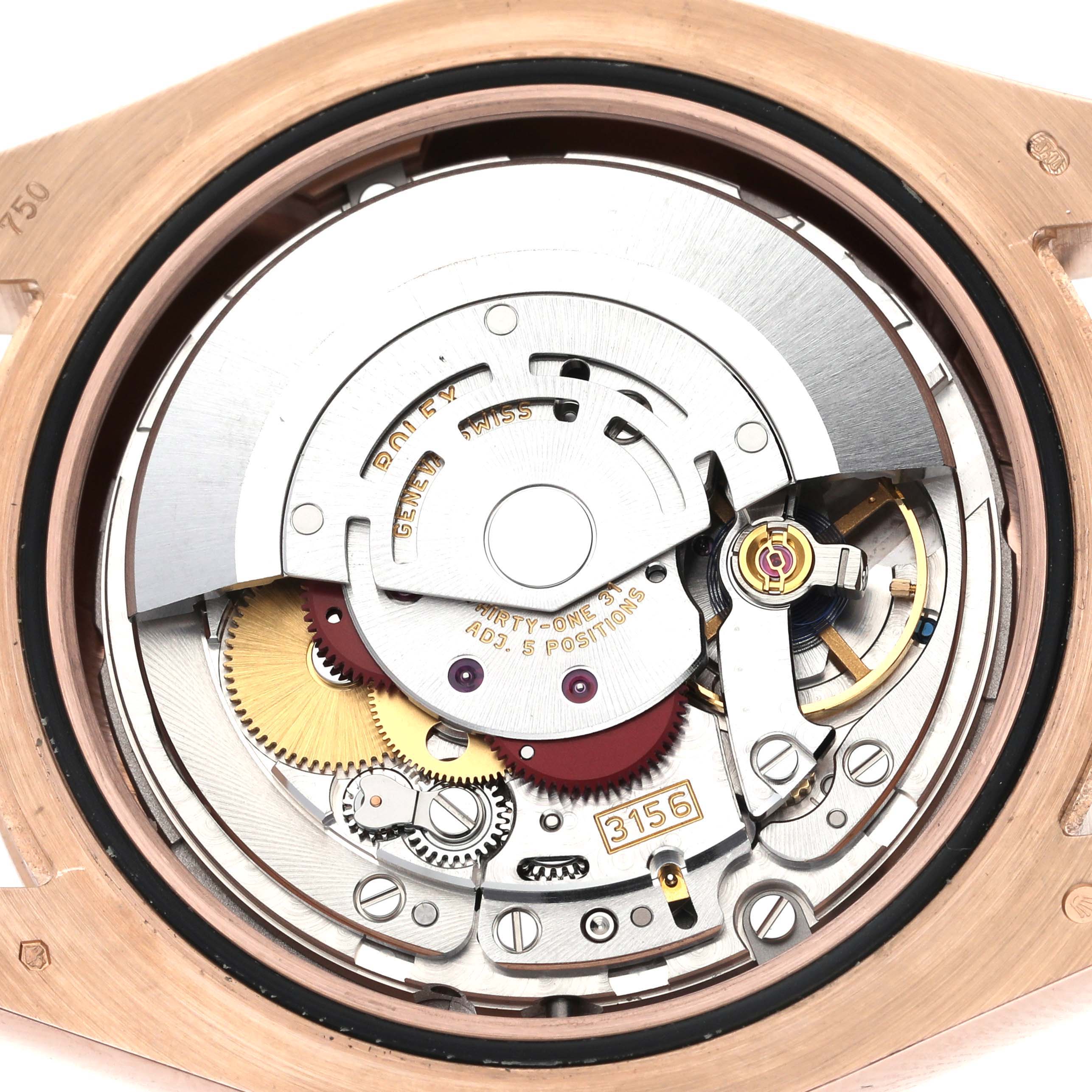 The image shows a close-up of the Rolex President 218235 Men's Rose Gold Brown Dial 218235 Men's Rose Gold Brown Dial model's movement, displaying gears and intricate mechanisms from the back.