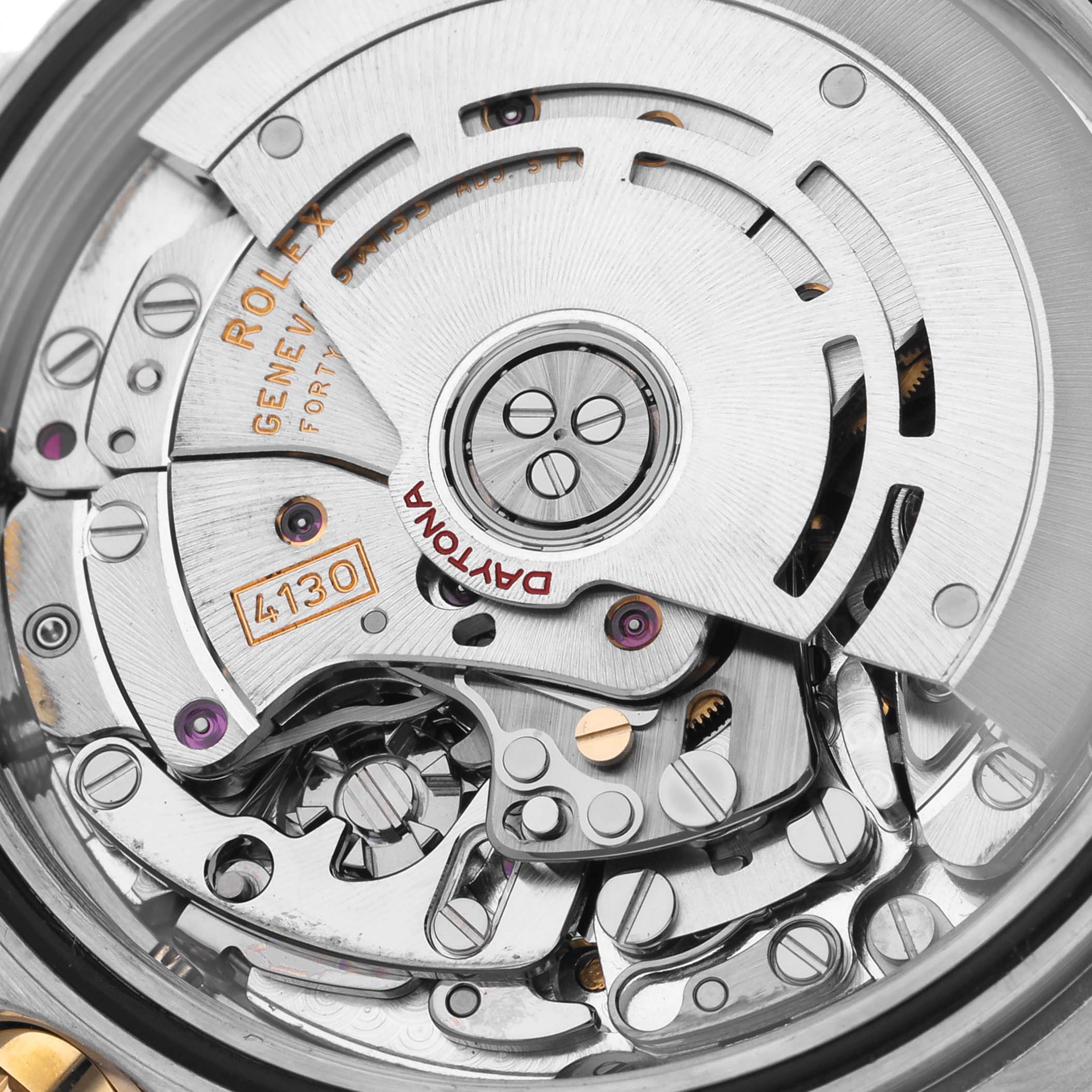 The image shows the movement of a Rolex Daytona 116523 Men's Steel and Gold (two tone) White Dial 116523 Men's Steel and Gold (two tone) White Dial watch, focusing on the intricate inner mechanism.