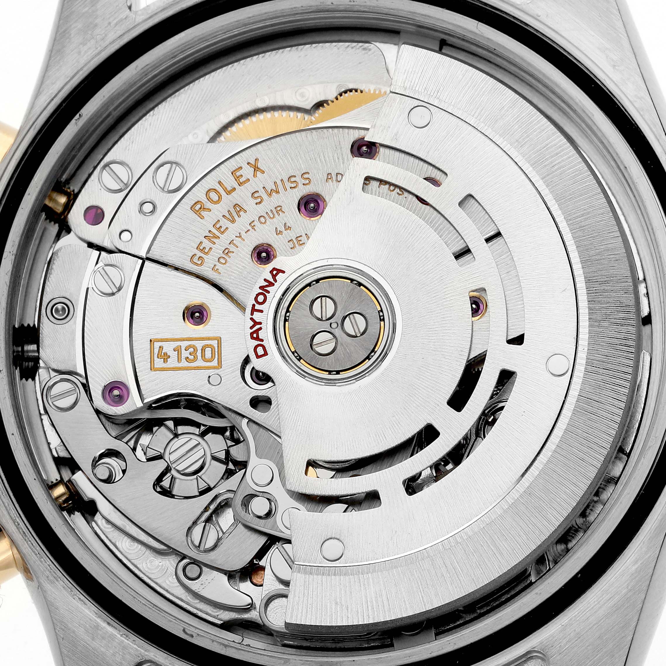 The image shows the movement mechanism of a Rolex Daytona 116523NR Men's Steel and Gold (two tone) Mother of Pearl Dial 116523NR Men's Steel and Gold (two tone) Mother of Pearl Dial watch from the rear angle, highlighting its intricate components.