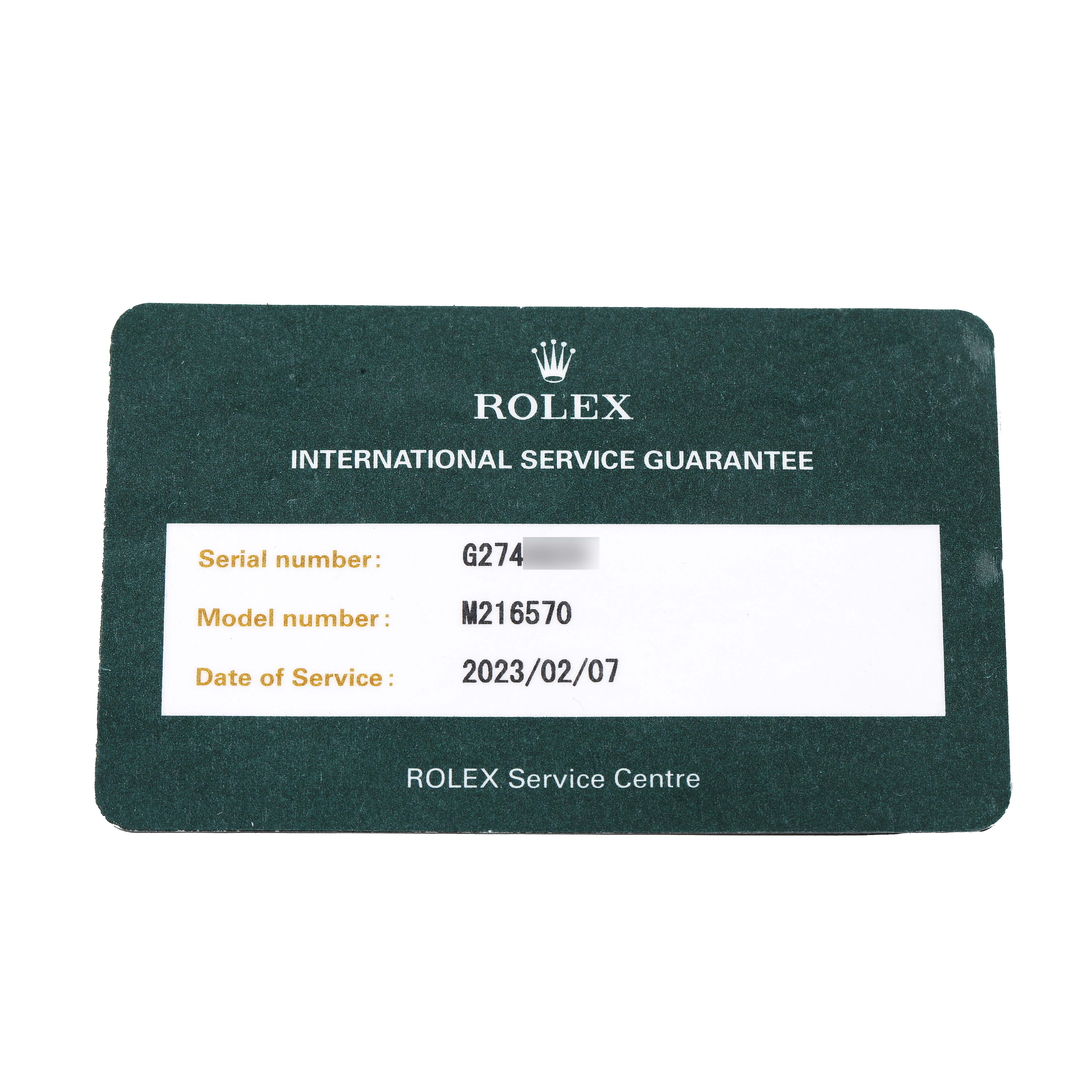 The image shows the Rolex Explorer 216570 Men's Stainless Steel White Dial service guarantee card with serial and model numbers.