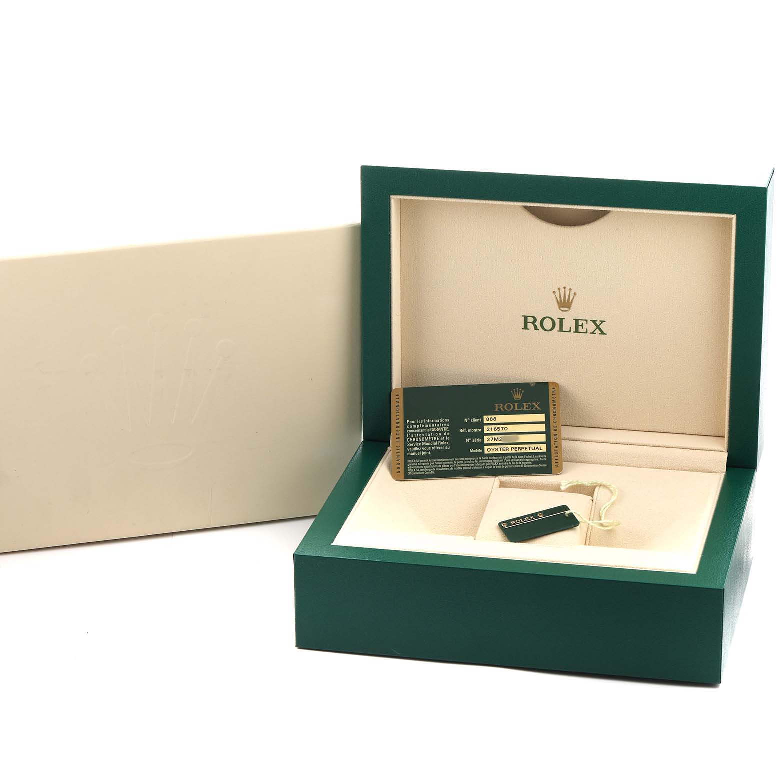 The image shows a Rolex Explorer 216570 Men's Stainless Steel White Dial watch box, warranty card, and tag from a top-front angle.