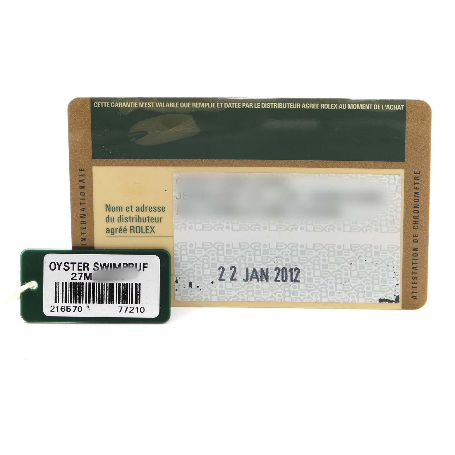 The image shows a warranty card and a hang tag for the Rolex Explorer 216570 Men's Stainless Steel White Dial model.