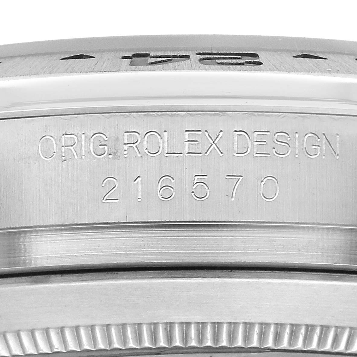 The image shows the side view of the Rolex Explorer 216570 Men's Stainless Steel White Dial, highlighting its edge and model number engraving.