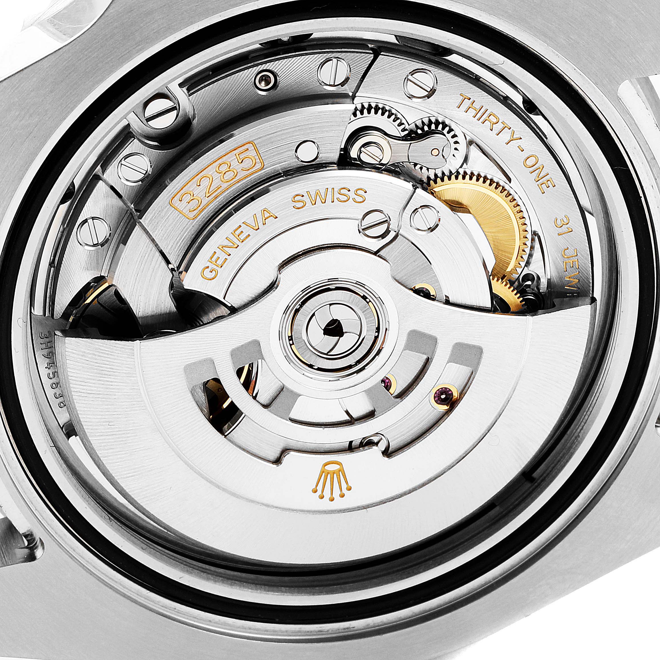 The image shows the movement and internal mechanism of a Rolex GMT-Master 126710 Men's Stainless Steel Black Dial 126710 Men's Stainless Steel Black Dial watch, showcasing the intricate details and engraving.