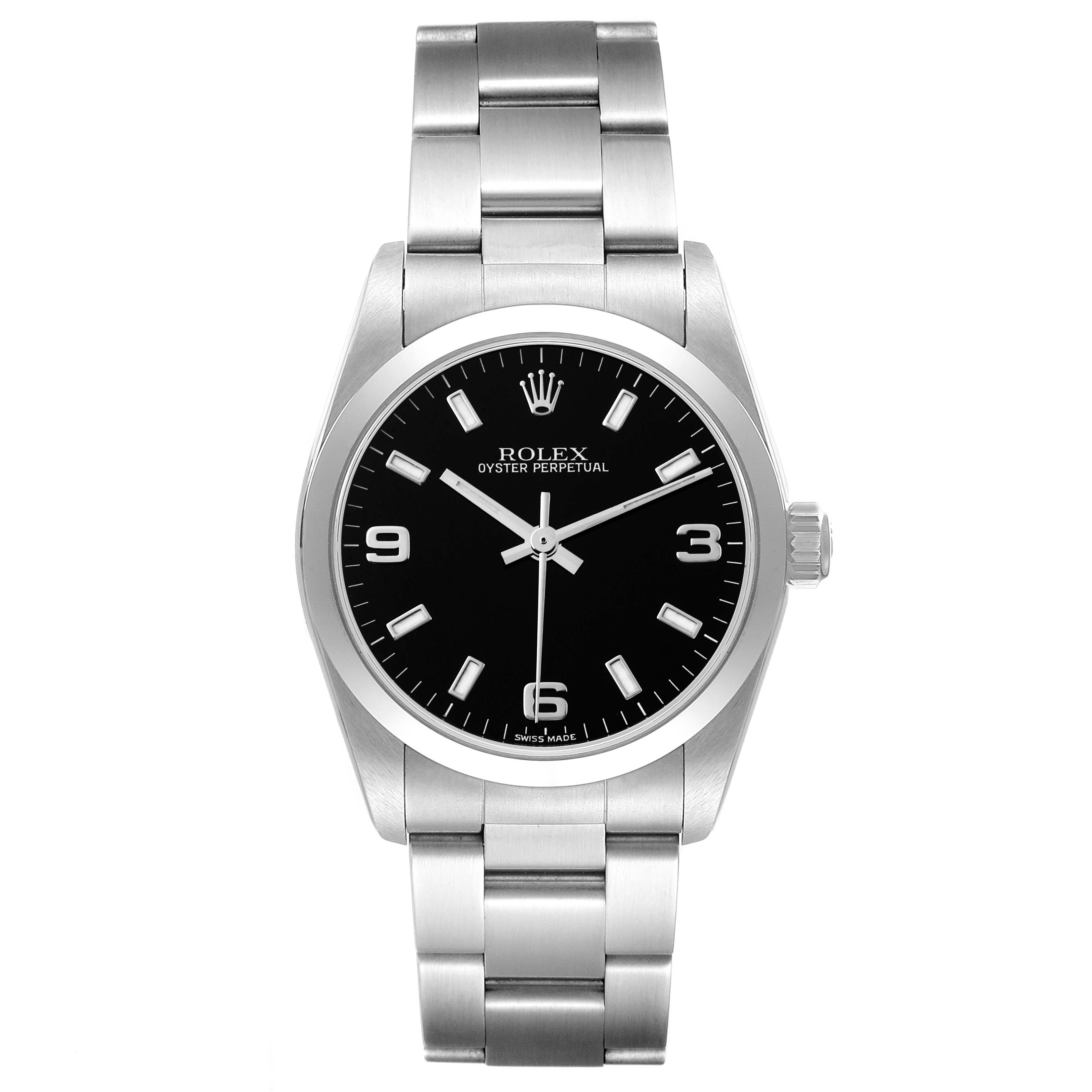 The image shows a front view of a Mid-Size Rolex Oyster Perpetual watch with a black dial and stainless steel bracelet.