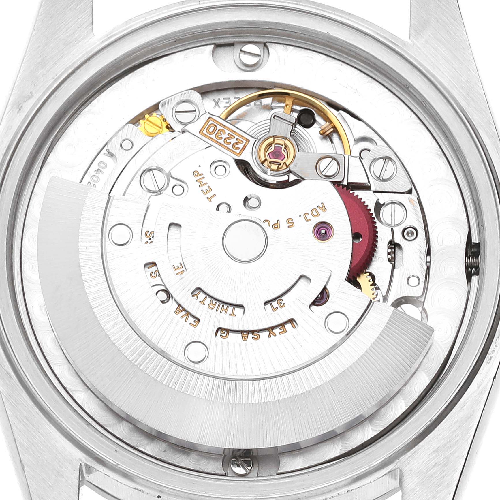 The image shows the inner mechanical movement of a Rolex Mid-Size 77080 Women
s Stainless Steel Black Dial 77080 Women
s Stainless Steel Black Dial watch from a rear angle, highlighting the rotor and internal components.