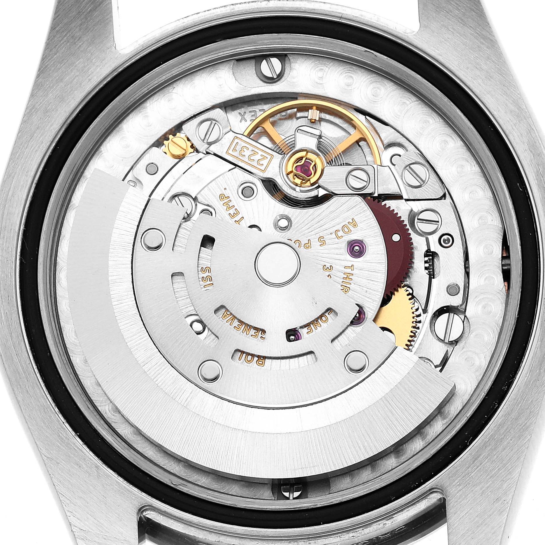 The image shows the back view of a Rolex Oyster Perpetual 177200 Women's Stainless Steel Pink Dial, highlighting its intricate movement and rotor.