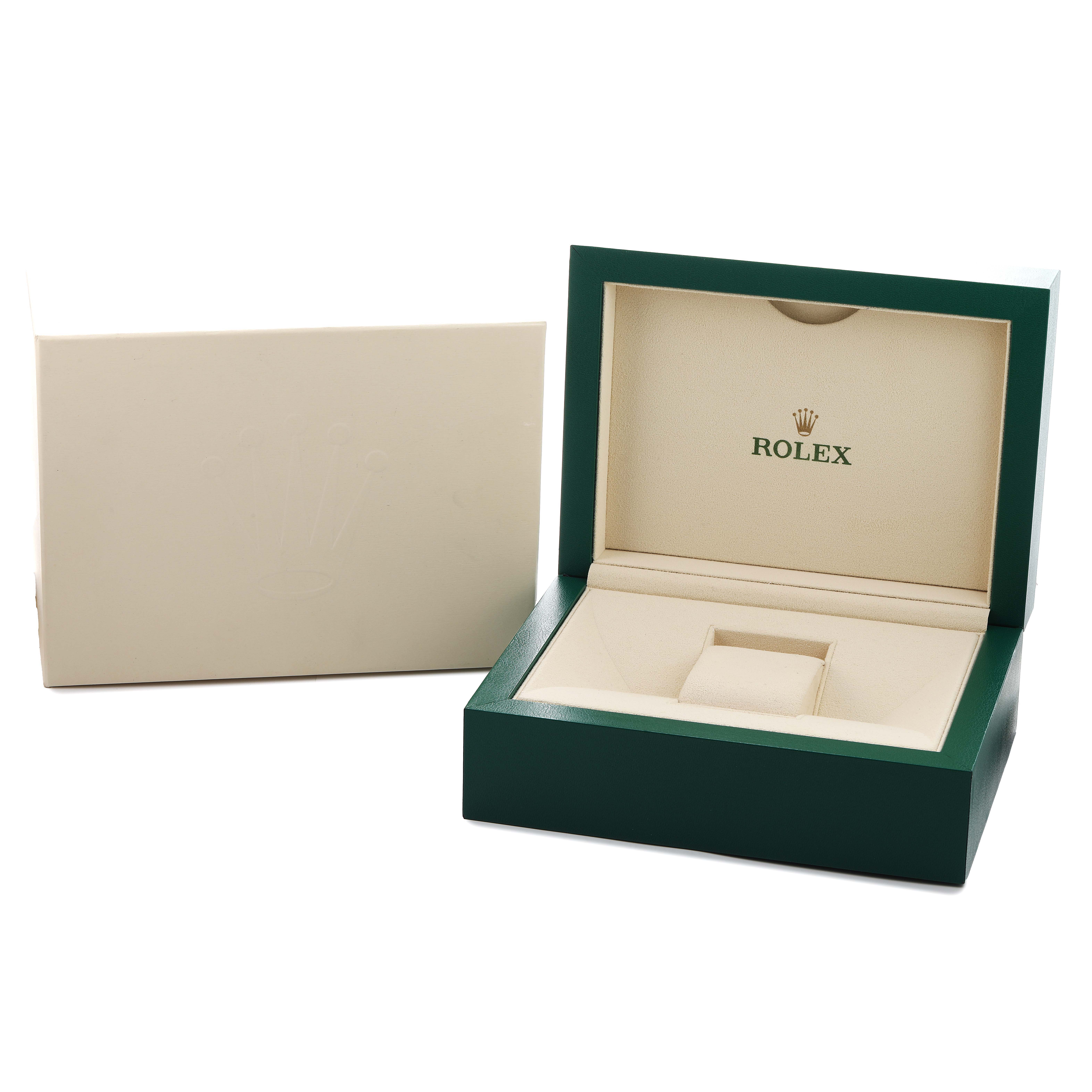 The image shows an open Rolex Oyster Perpetual 177200 Women's Stainless Steel Pink Dial watch box at an angle, revealing its interior and an outer protective sleeve.