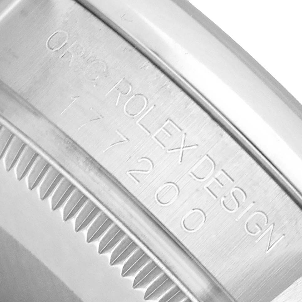 The image shows the inner bezel with engravings on the Rolex Oyster Perpetual 177200 Women's Stainless Steel Pink Dial watch.