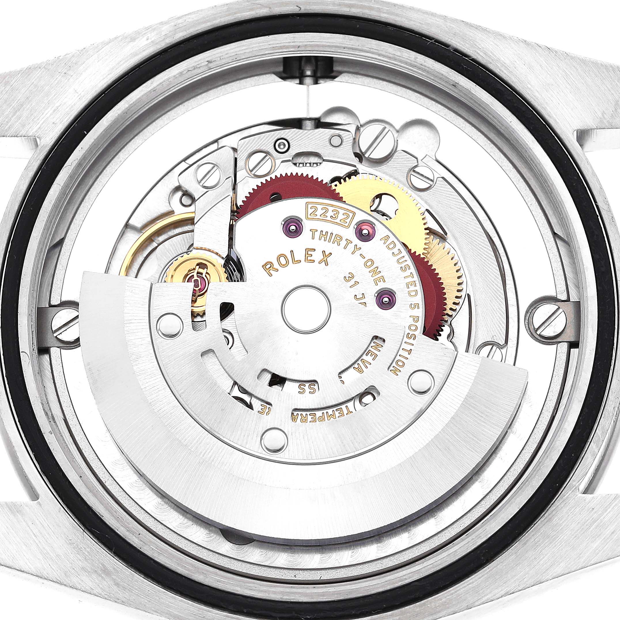 This image shows the internal movement mechanism of a Rolex Oyster Perpetual 124200 Men's Stainless Steel Silver Dial 124200 Men's Stainless Steel Silver Dial watch from a top-down angle.