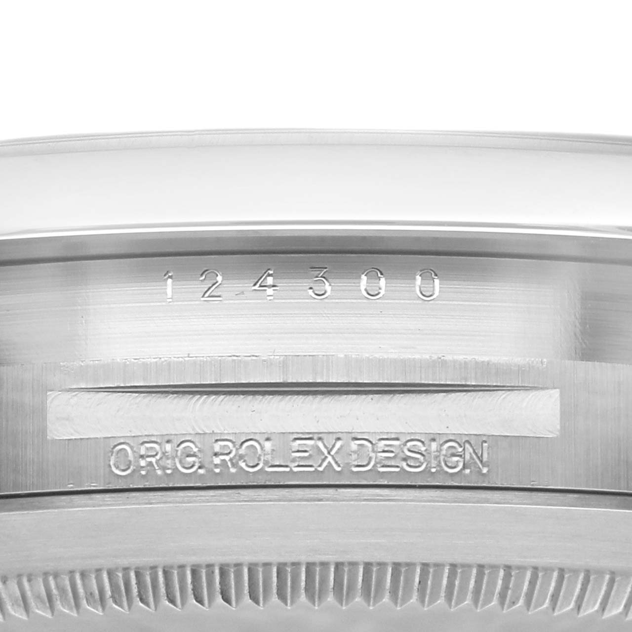 The image shows the side view of a Rolex Oyster Perpetual 124300 Men's Stainless Steel Green Dial 124300 Men's Stainless Steel Green Dial watch, highlighting the engraved model number and design inscription.