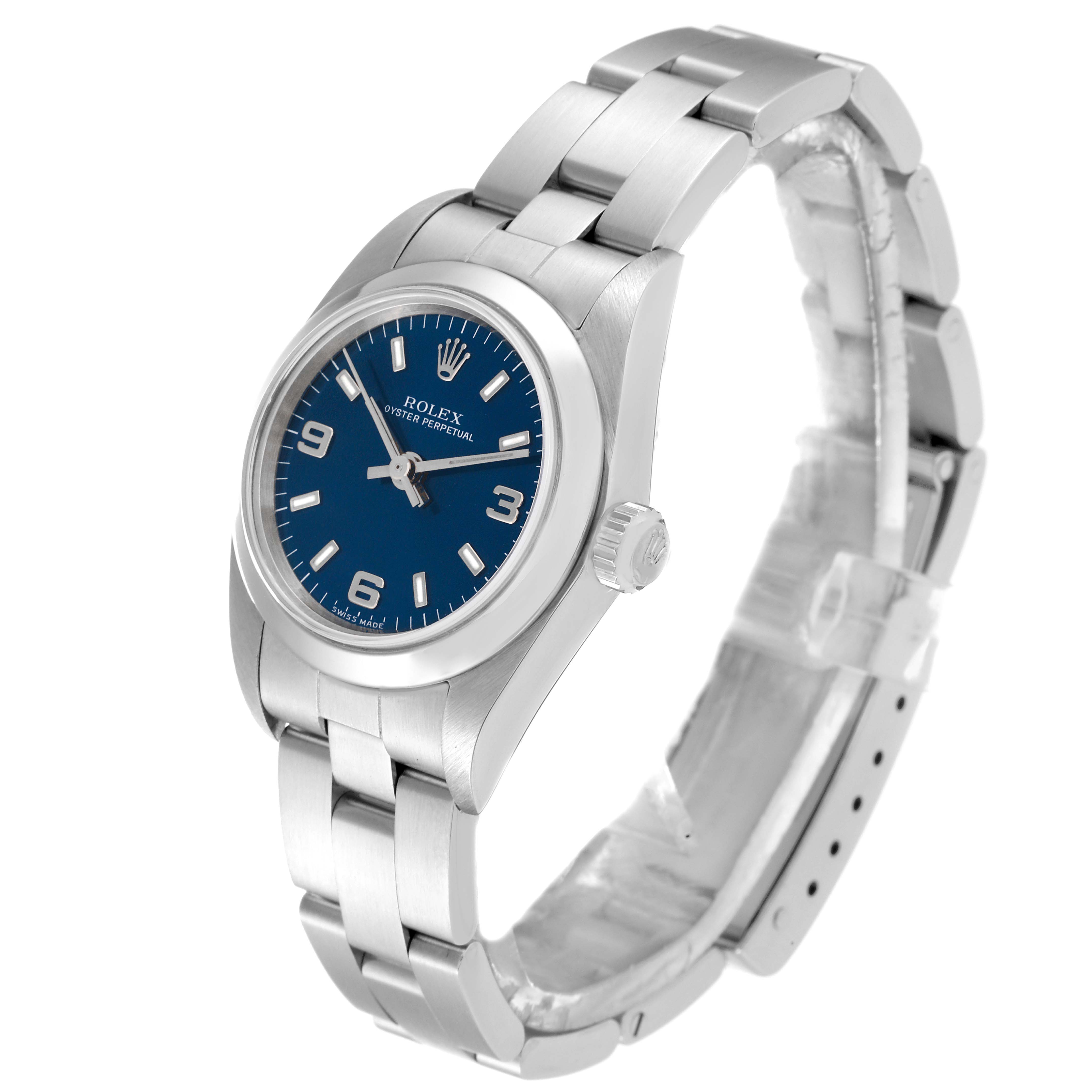 The image shows a Rolex Oyster Perpetual 76080 Women
s Stainless Steel Blue Dial 76080 Women
s Stainless Steel Blue Dial watch at an angled side view, highlighting the dial, bezel, and bracelet.