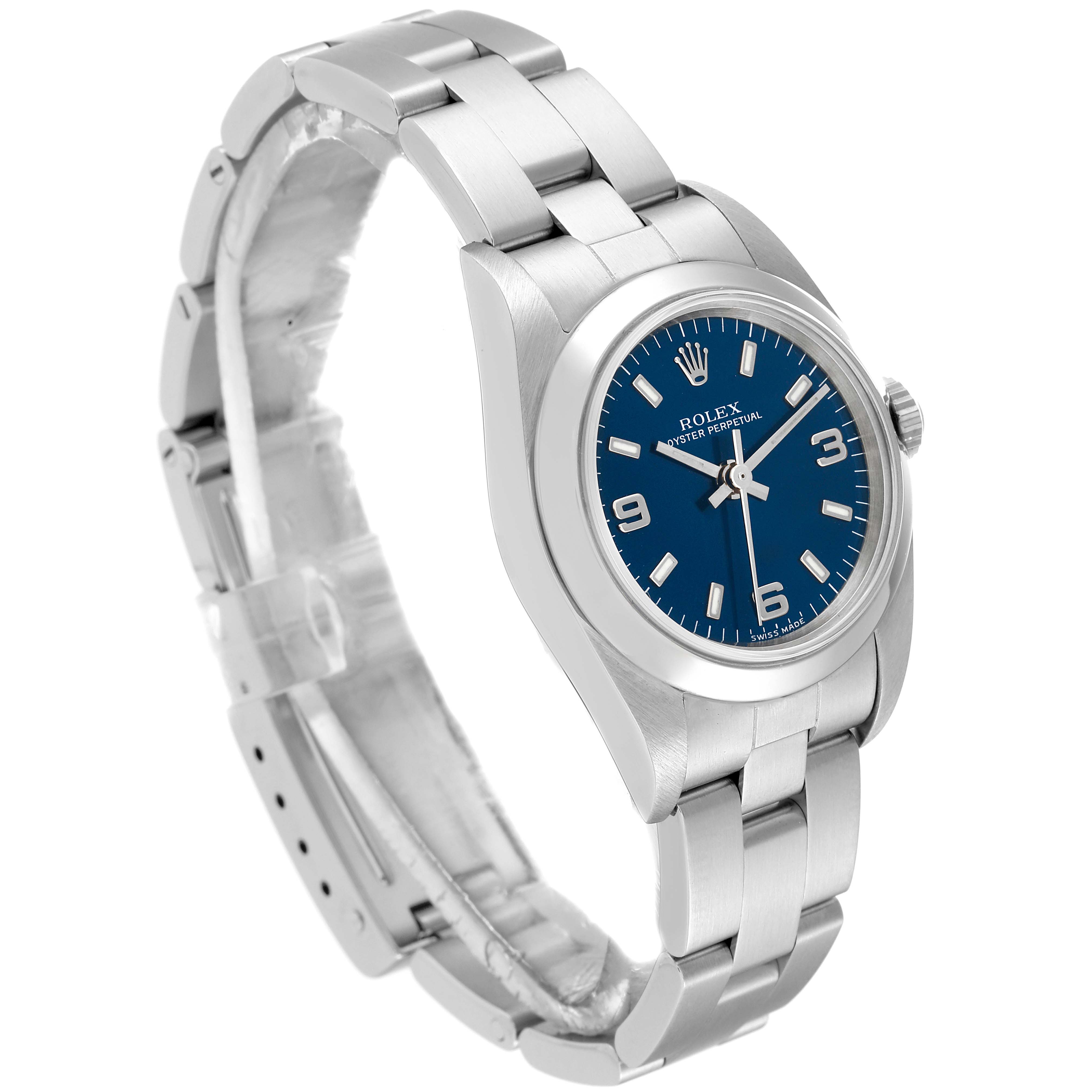The image shows a side and partial front view of a Rolex Oyster Perpetual 76080 Women
s Stainless Steel Blue Dial 76080 Women
s Stainless Steel Blue Dial watch with a blue dial and metal bracelet.