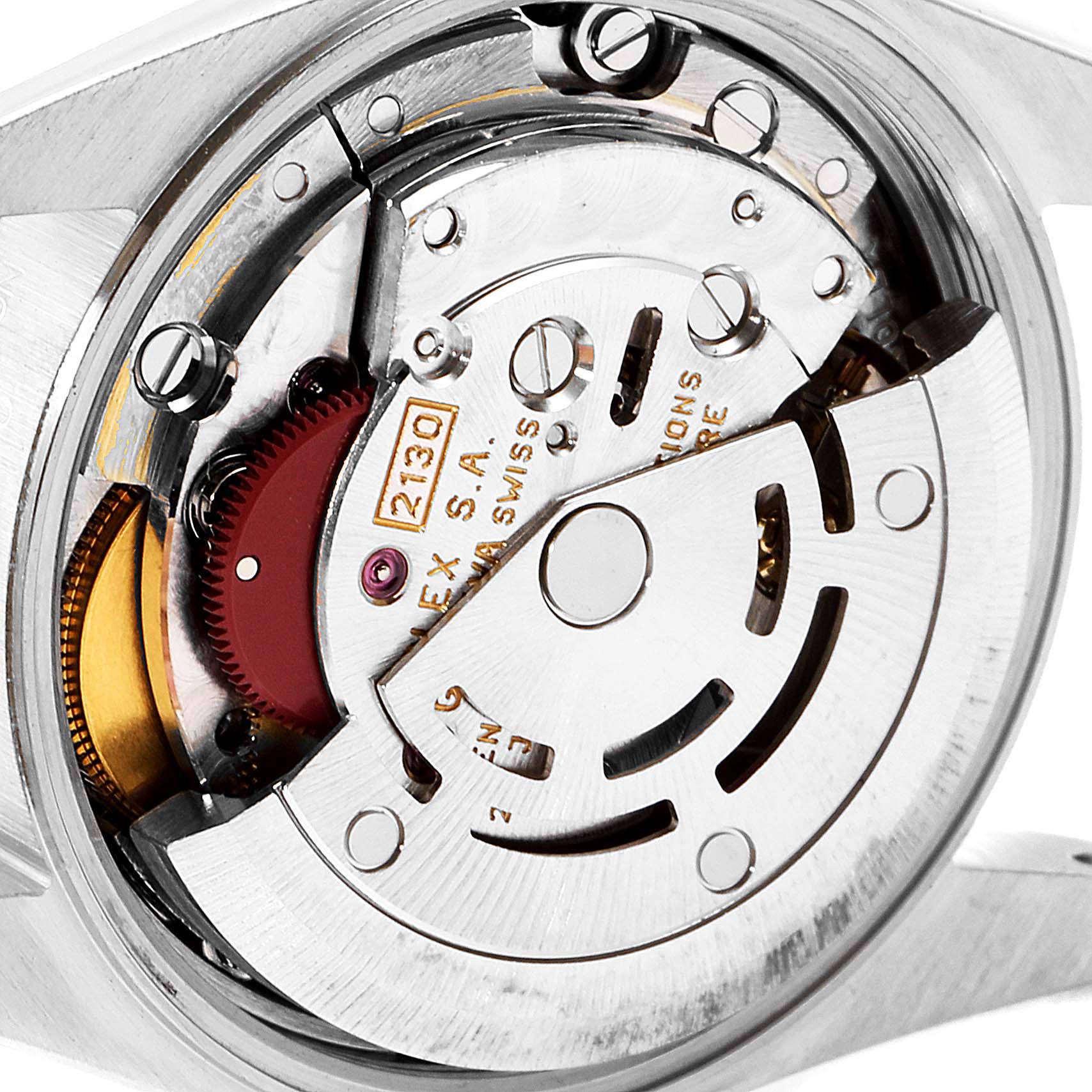 The image shows a close-up of the internal movement mechanism of a Rolex Oyster Perpetual 67180 Women's Stainless Steel Pink Dial 67180 Women's Stainless Steel Pink Dial watch.