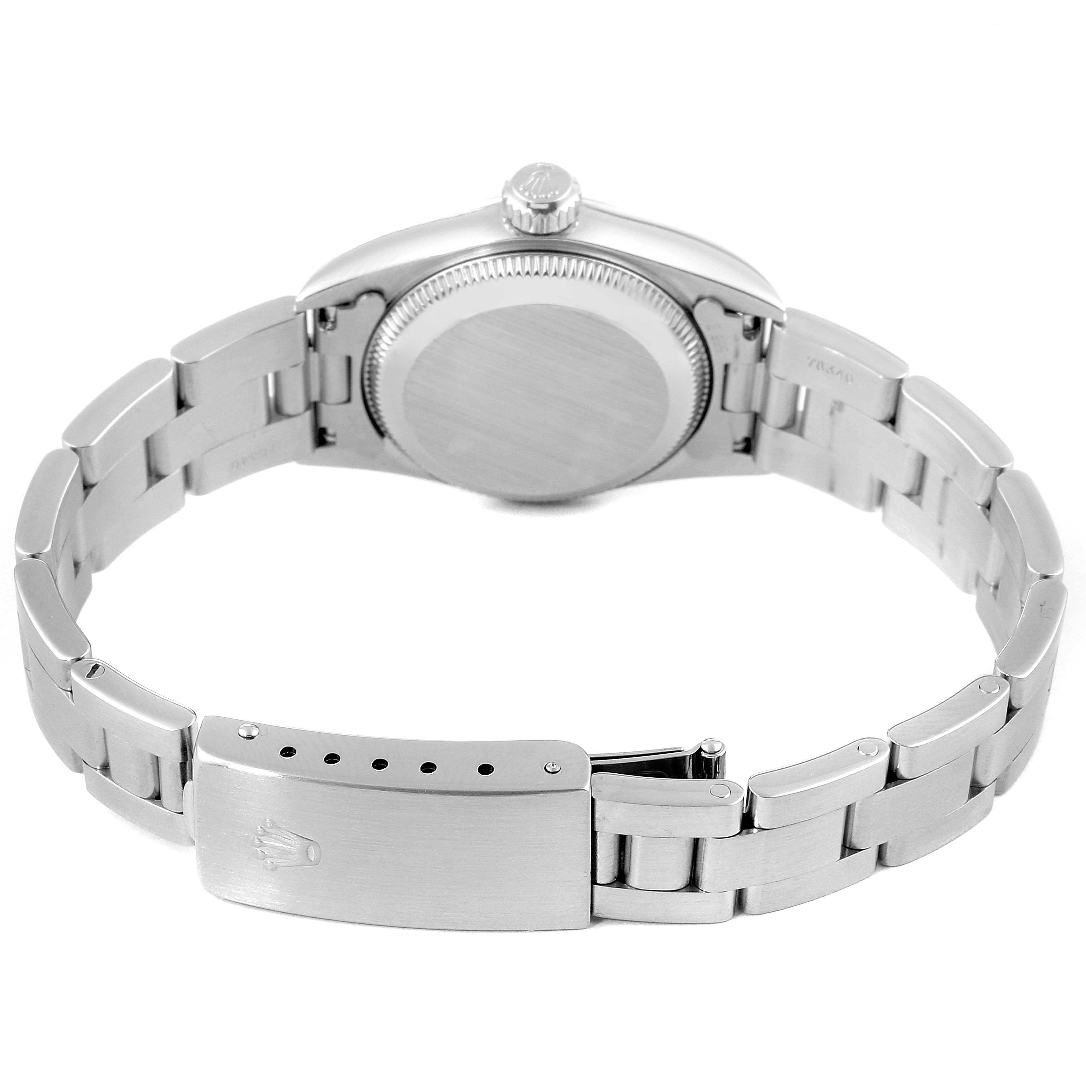 This image shows the back view of an Oyster Perpetual watch by Rolex, highlighting the case and bracelet clasp.