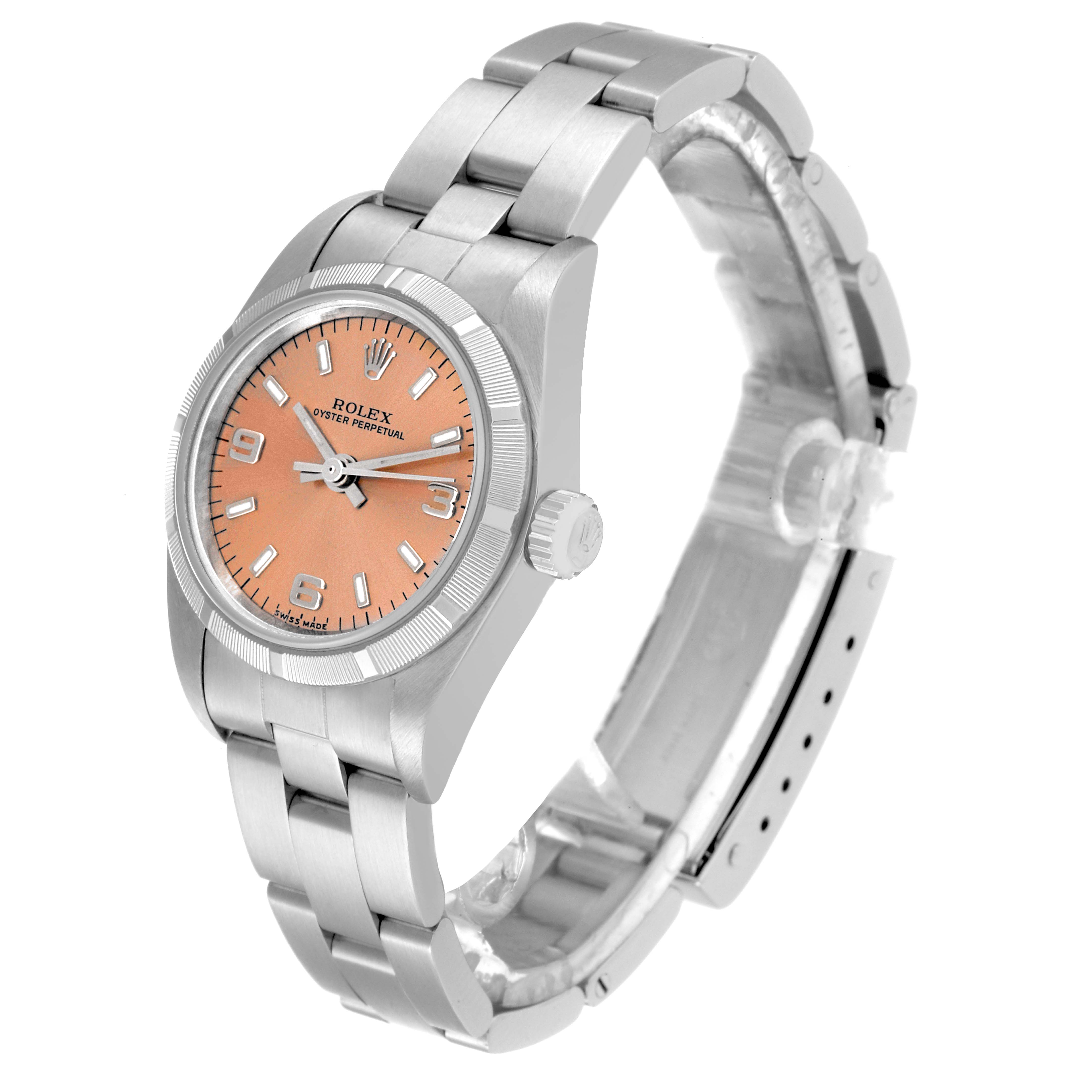 The image shows a side-angle view of a Rolex Oyster Perpetual 76030 Women
s Stainless Steel Pink Dial 76030 Women
s Stainless Steel Pink Dial watch featuring its face, bezel, crown, and bracelet.