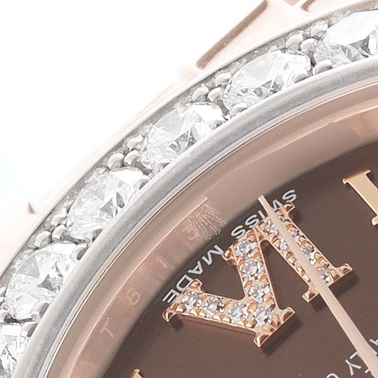 The image shows a close-up of a Rolex Pearlmaster 81285 Women's Rose Gold Brown Dial watch dial and diamond bezel at an oblique angle.