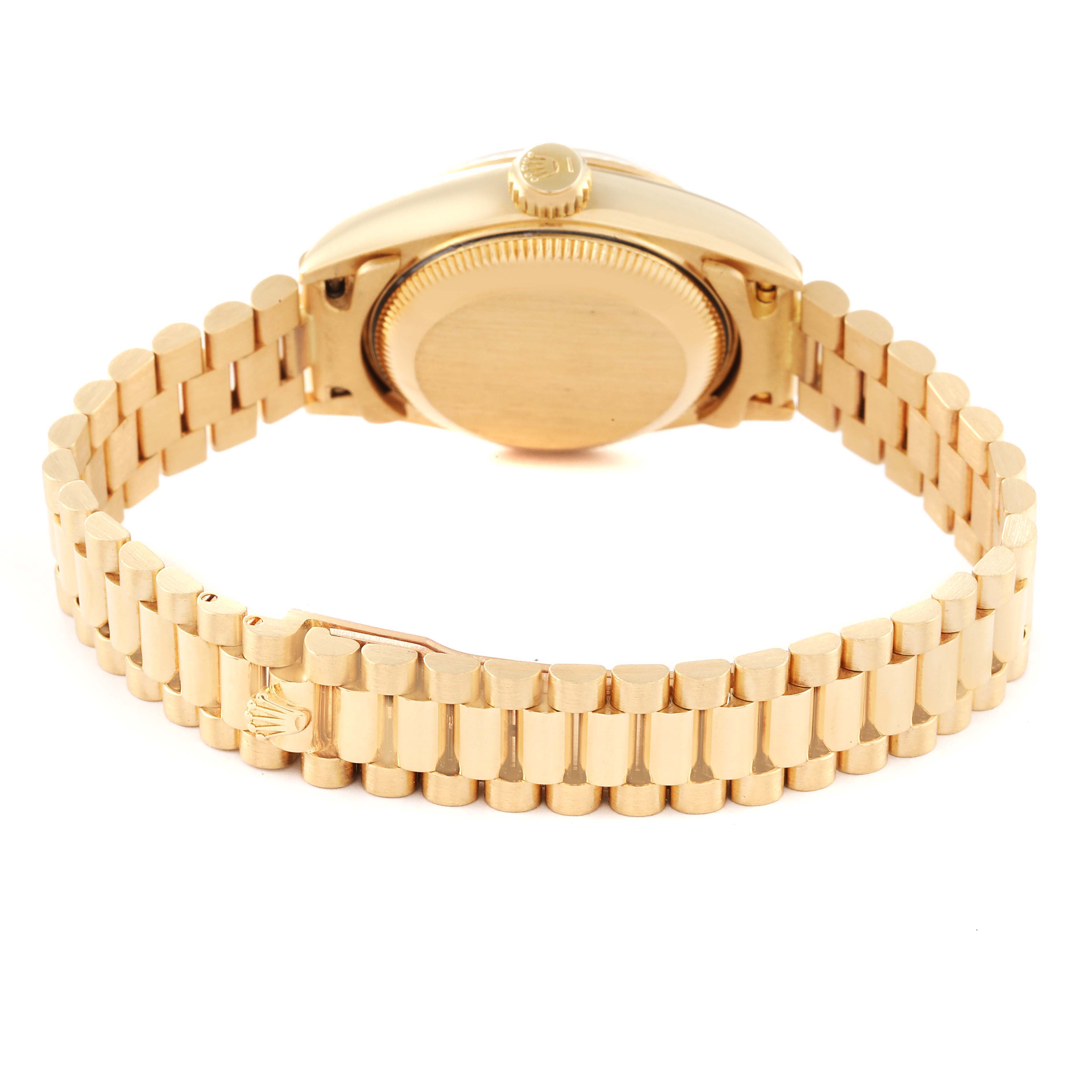 The image shows the back view of a Rolex President 69178 Women
s Yellow Gold Champagne Dial 69178 Women
s Yellow Gold Champagne Dial model watch, focusing on its bracelet and clasp.
