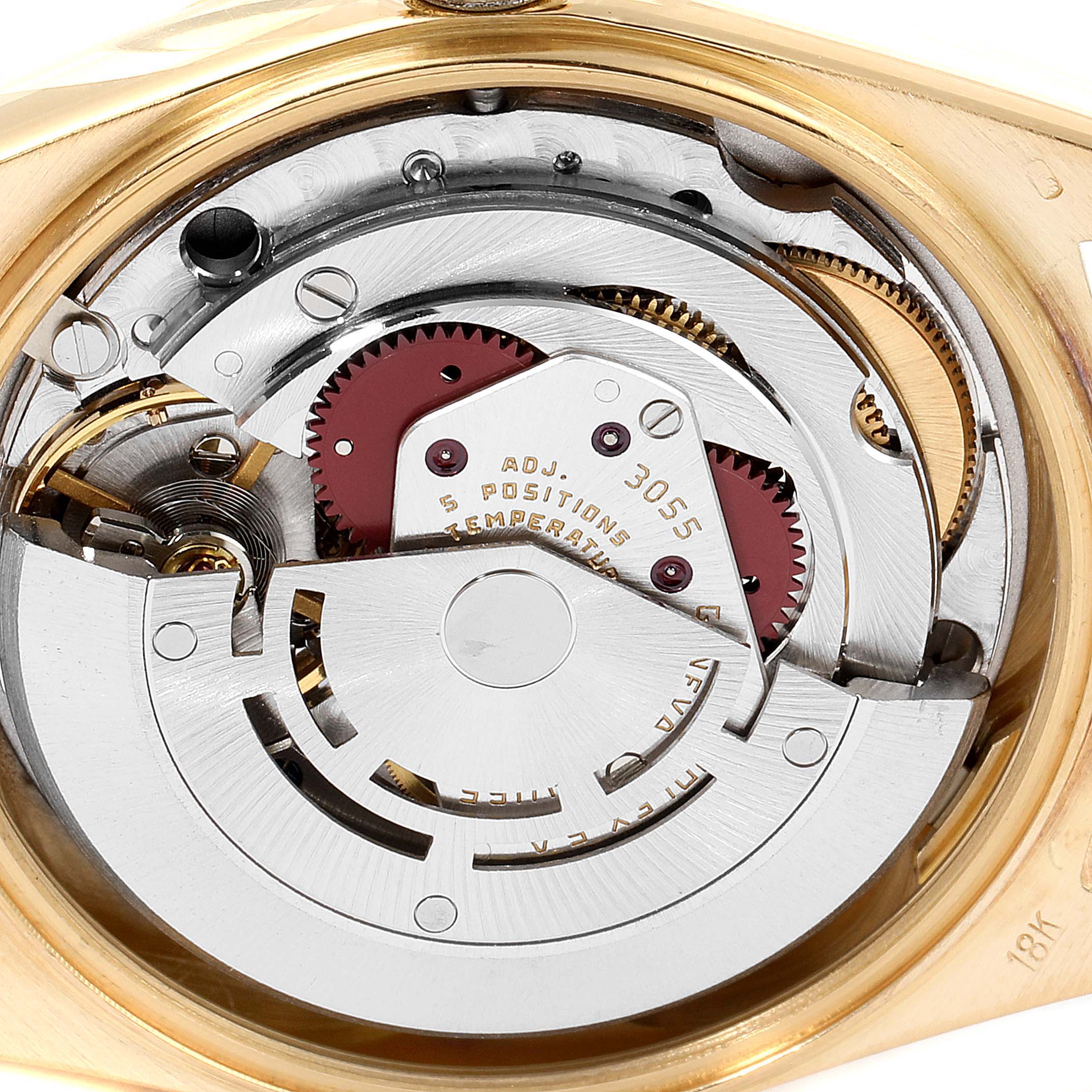 This image shows the intricate internal mechanism of a Rolex President 18038 Men
s Yellow Gold Champagne Dial 18038 Men
s Yellow Gold Champagne Dial model watch from a close-up, rear angle.