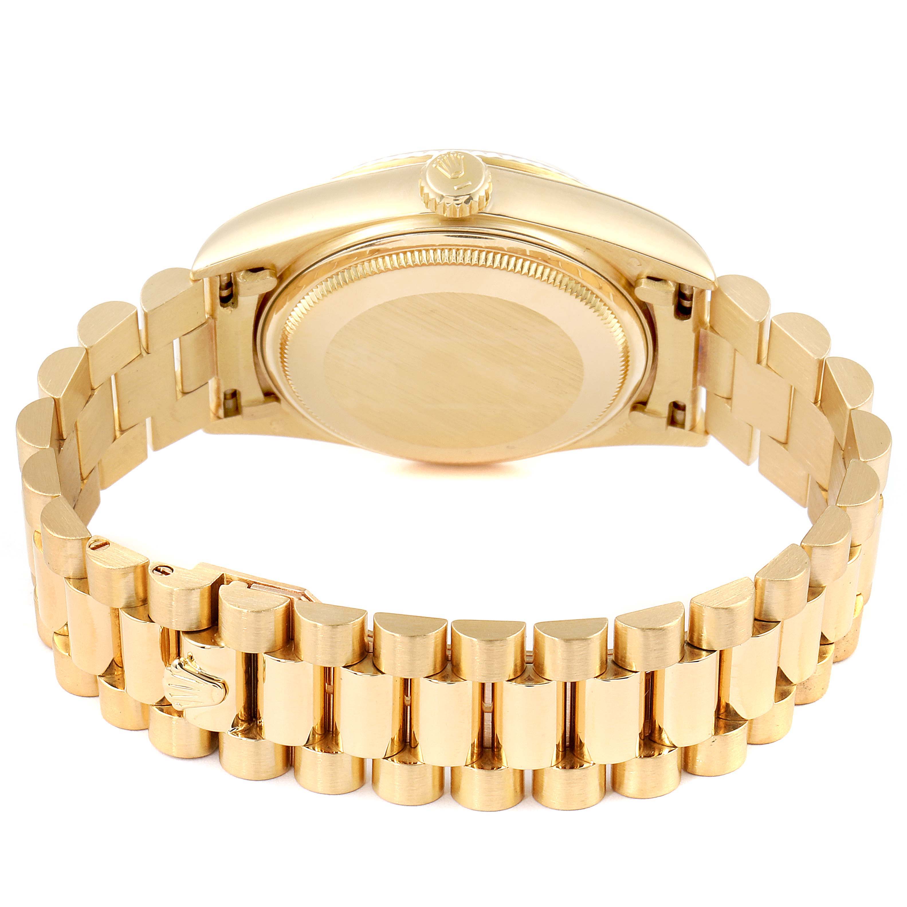 The image shows the back case and bracelet of a Rolex President 18038 Men
s Yellow Gold Champagne Dial 18038 Men
s Yellow Gold Champagne Dial model watch from an oblique angle.