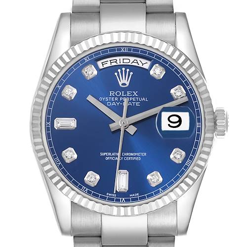 The Rolex President model is shown from the front, displaying the dial, hands, day, date windows, bezel, and part of the bracelet.