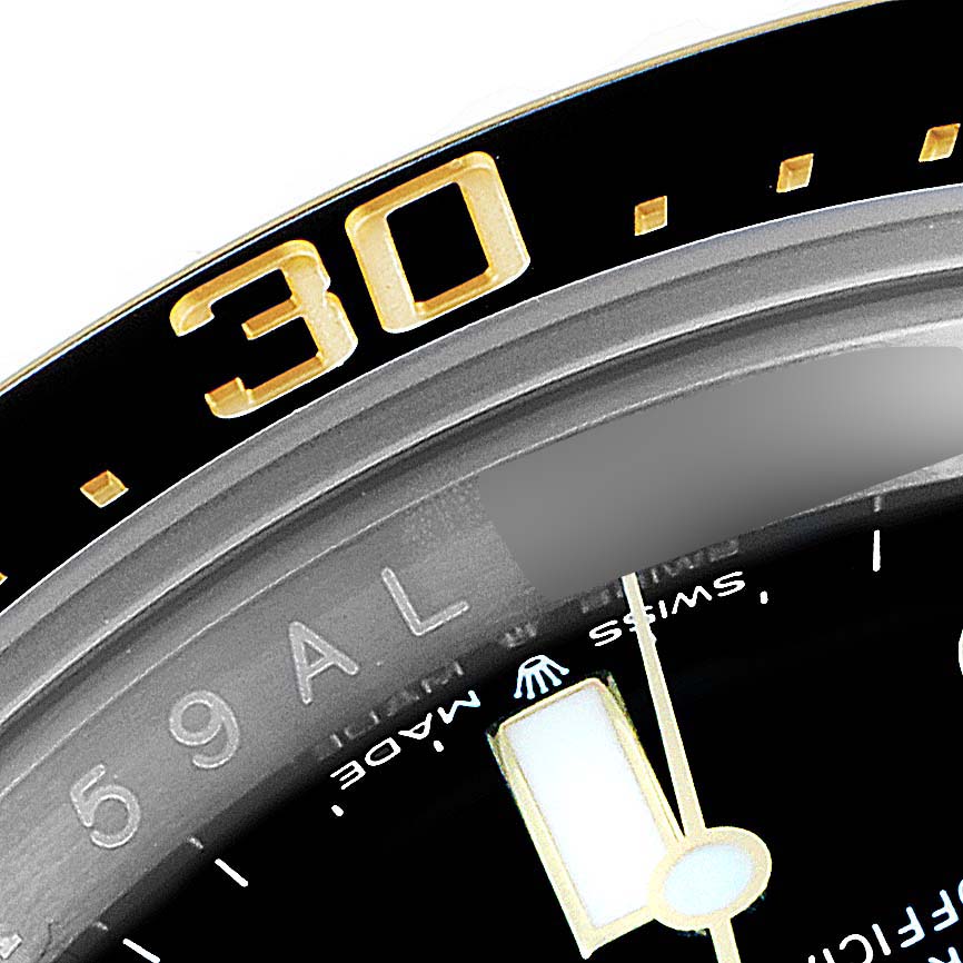 The close-up image shows the bezel, part of the dial, and minute hand of the Rolex Sea-Dweller 126603 Men
s Steel and Gold (two tone) Black Dial 126603 Men
s Steel and Gold (two tone) Black Dial watch.