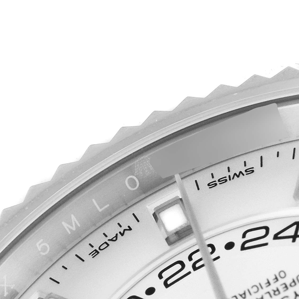 This image shows a close-up of the dial and part of the bezel of a Rolex Sky-Dweller 326934 Men's Stainless Steel White Dial 326934 Men's Stainless Steel White Dial watch.