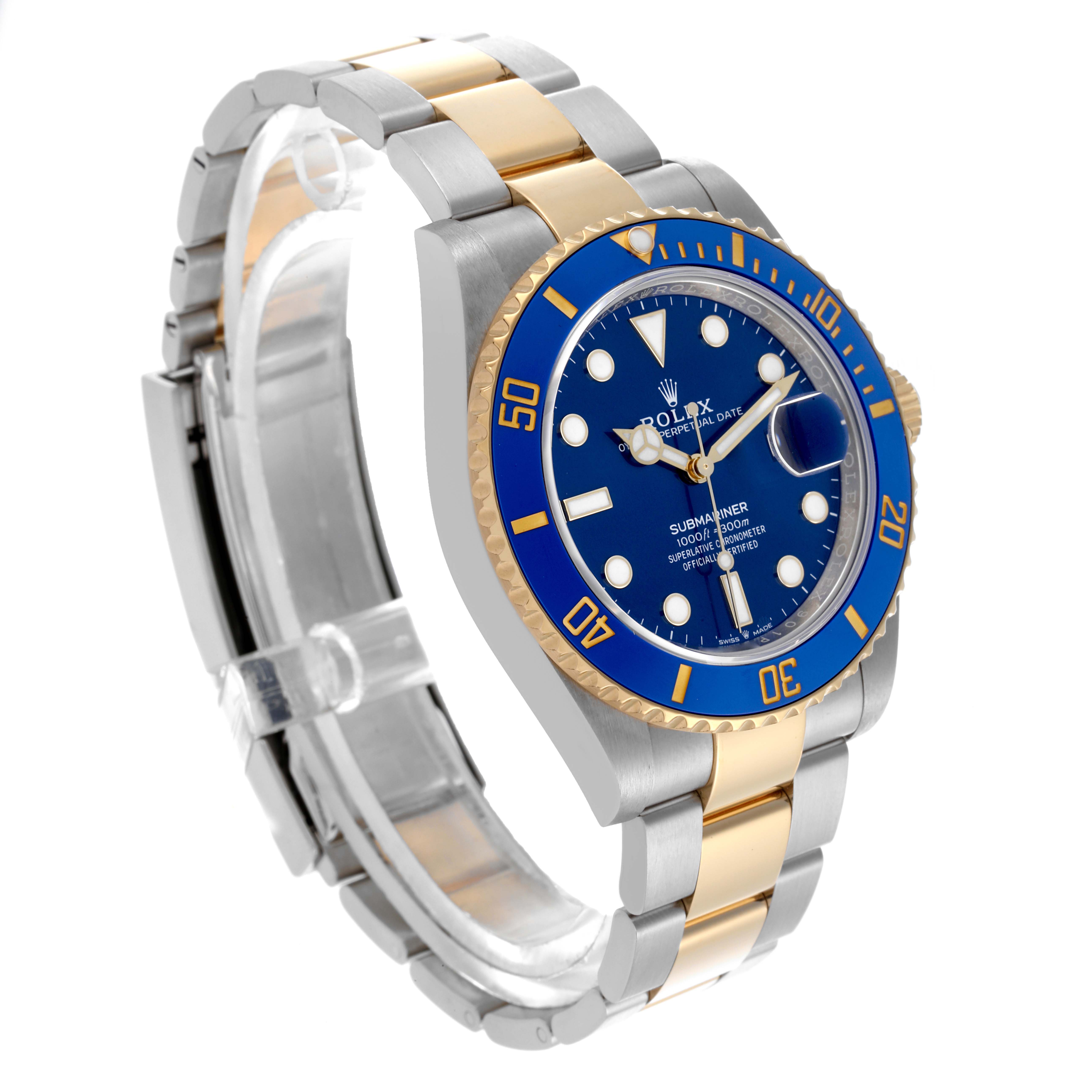 The Rolex Submariner 126613LB Men's Steel and Gold (two tone) Blue Dial 126613LB Men's Steel and Gold (two tone) Blue Dial watch is shown at an angle displaying its blue dial, bezel, and two-tone bracelet.
