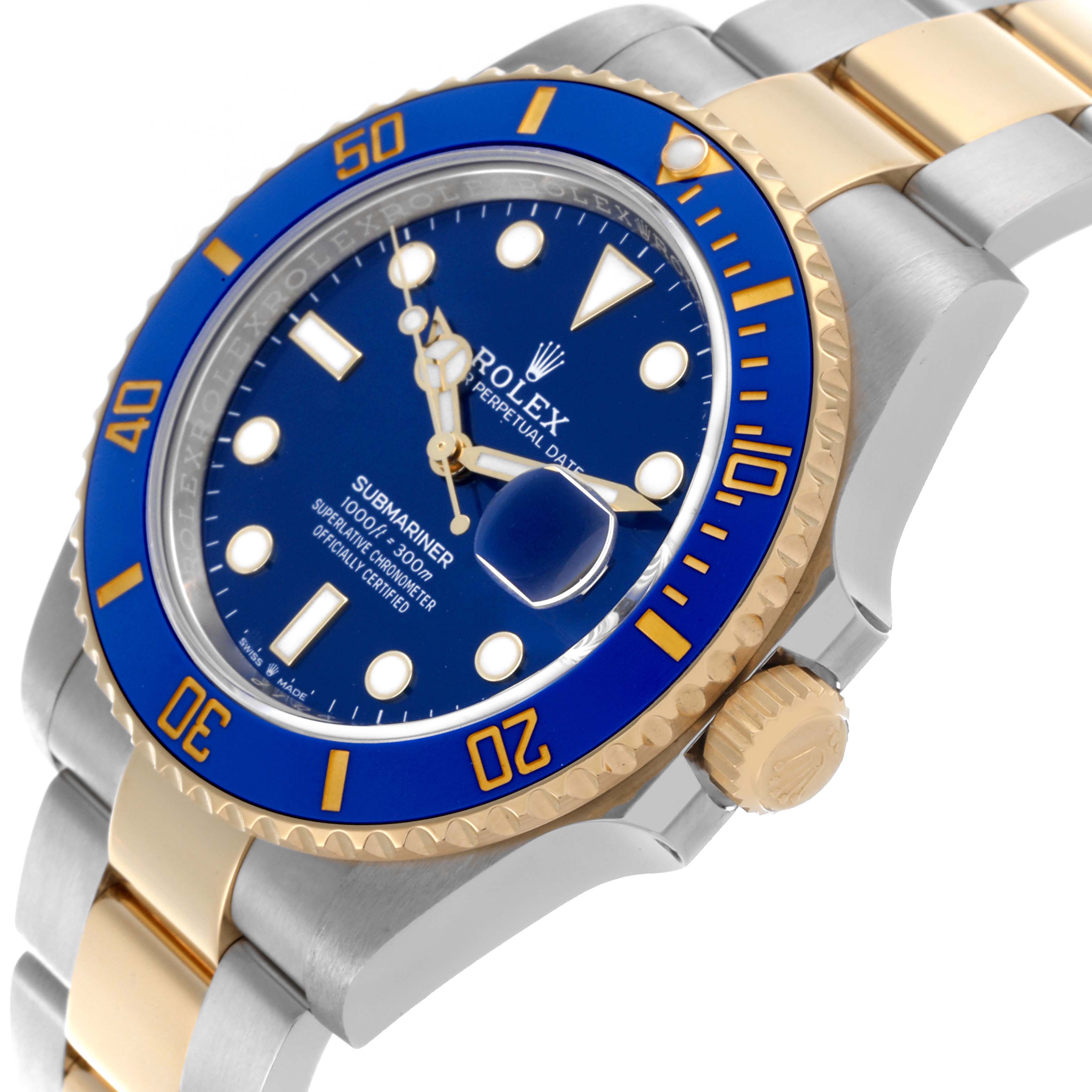 The image shows a Rolex Submariner 126613LB Men's Steel and Gold (two tone) Blue Dial 126613LB Men's Steel and Gold (two tone) Blue Dial from a side angle, featuring its blue dial, bezel, and two-tone bracelet.