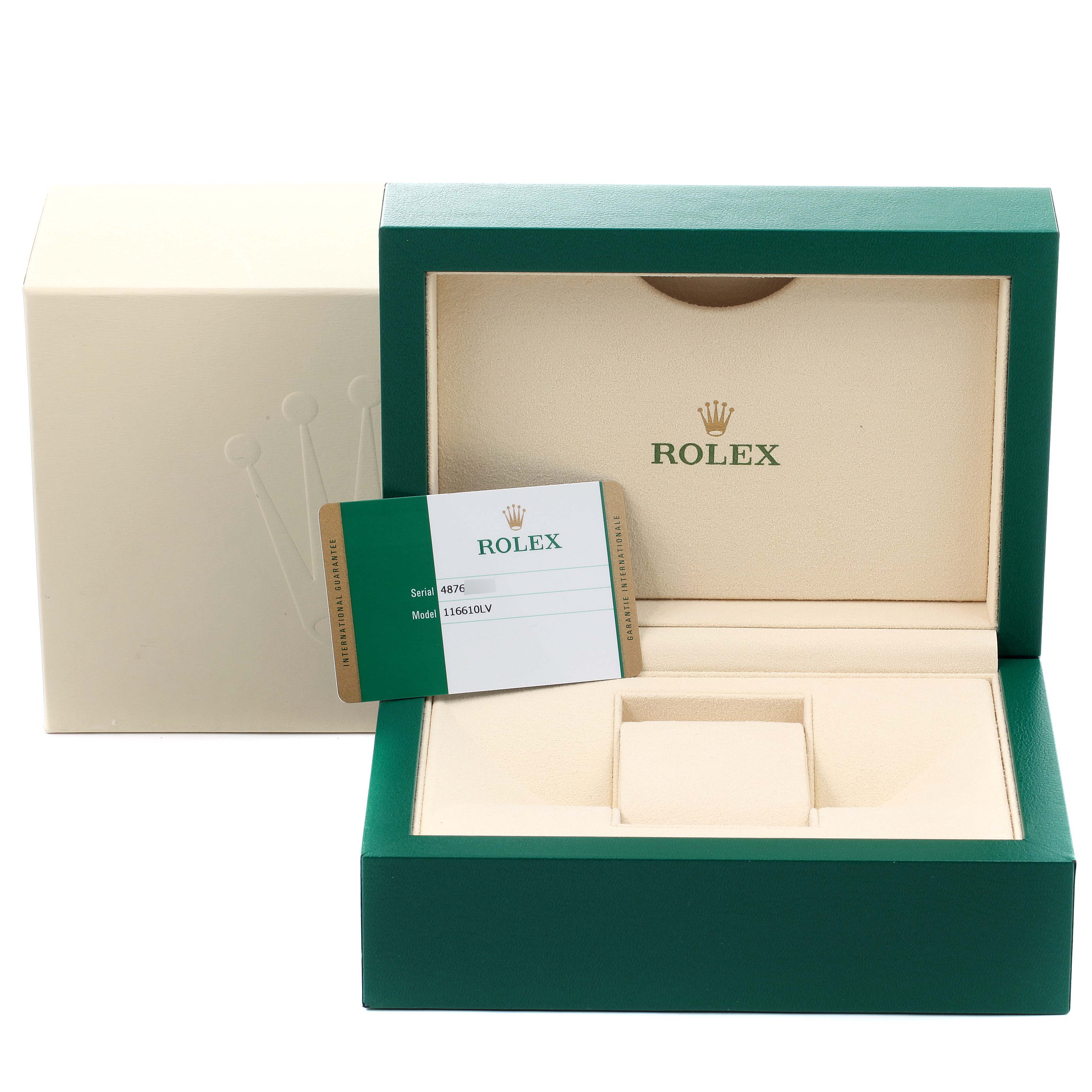 The image shows an empty Rolex watch box for the Submariner model, along with its warranty card.