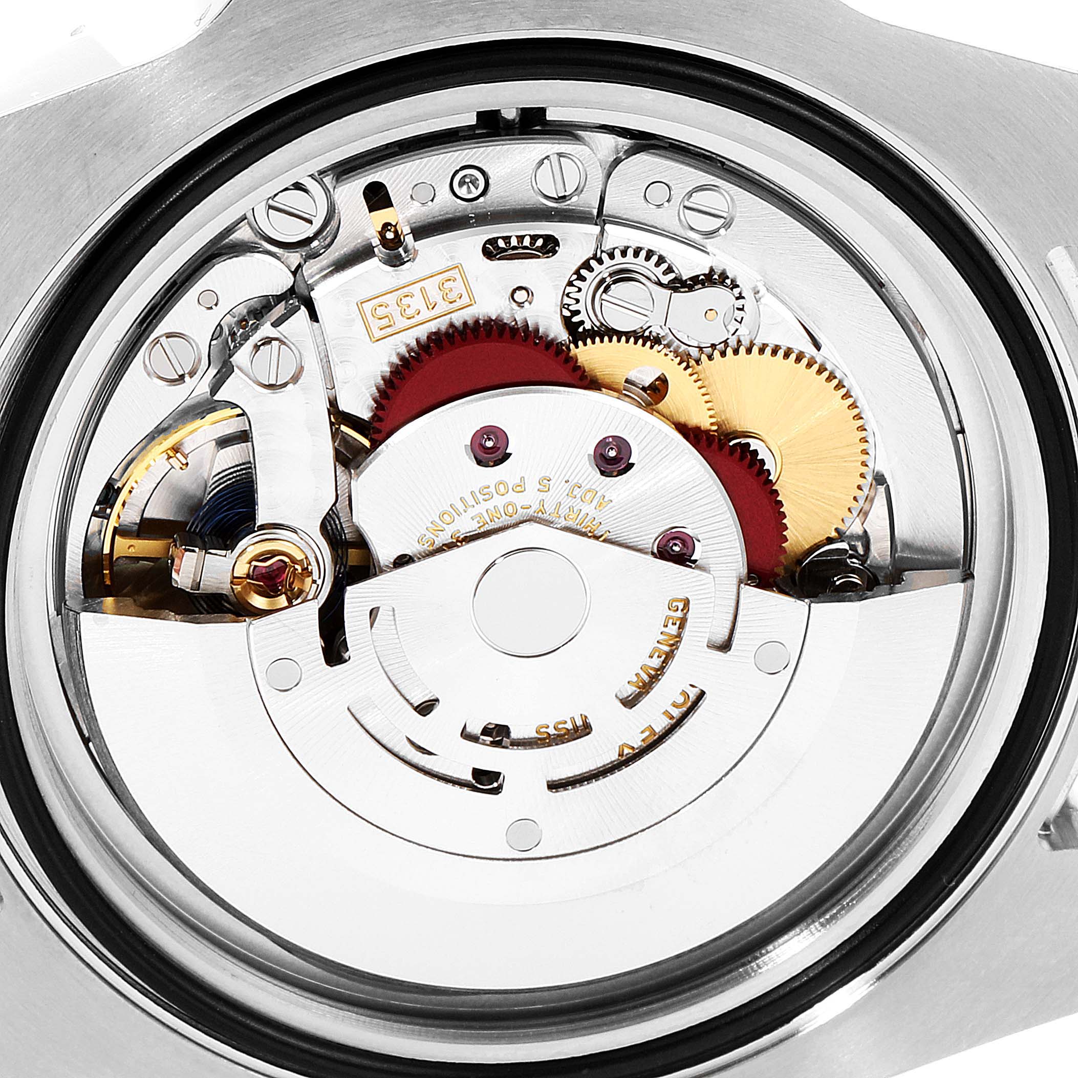 The image shows a close-up of the movement mechanism inside a Rolex Submariner 116610LV Men
s Stainless Steel Green Dial 116610LV Men
s Stainless Steel Green Dial watch, highlighting gears and intricate components.